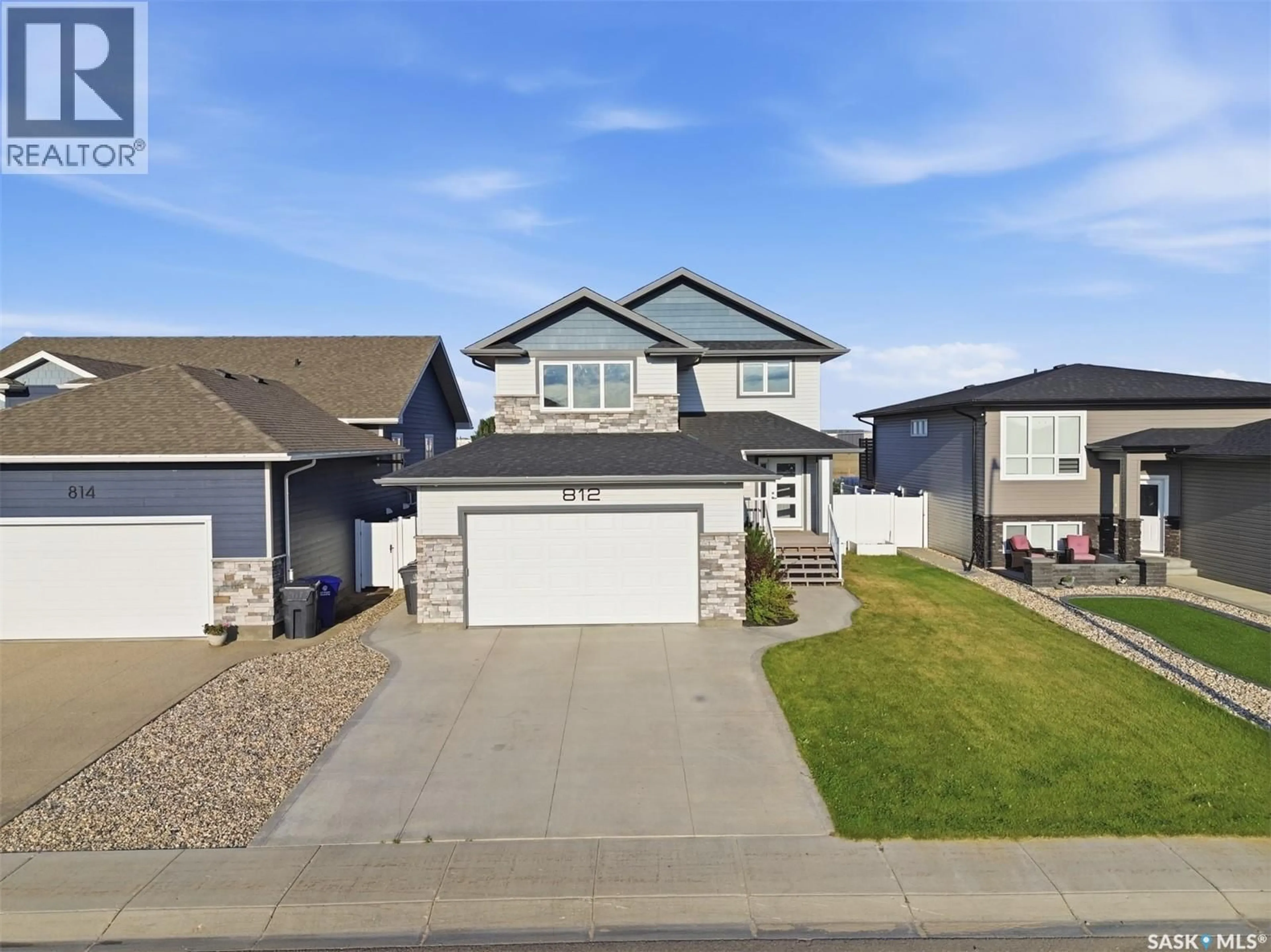 A pic from outside/outdoor area/front of a property/back of a property/a pic from drone, street for 812 1ST AVENUE N, Warman Saskatchewan S0K4S5