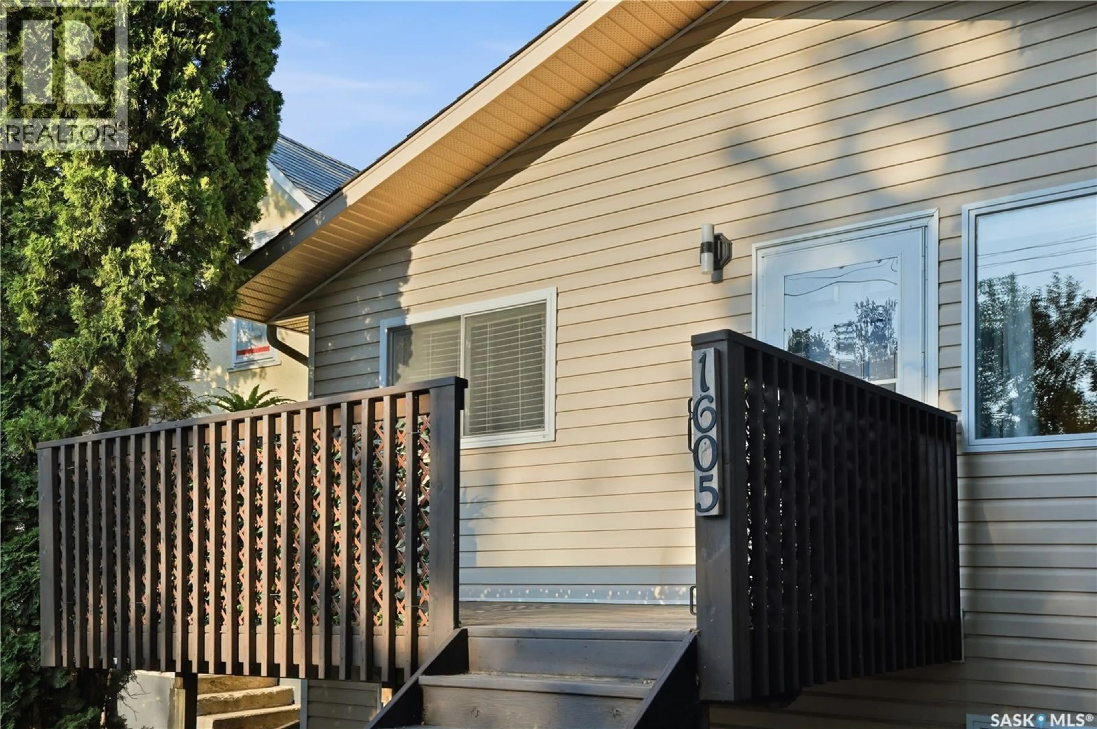 Home with vinyl exterior material, street for 1605 CENTRAL AVENUE, Saskatoon Saskatchewan S7N2T4