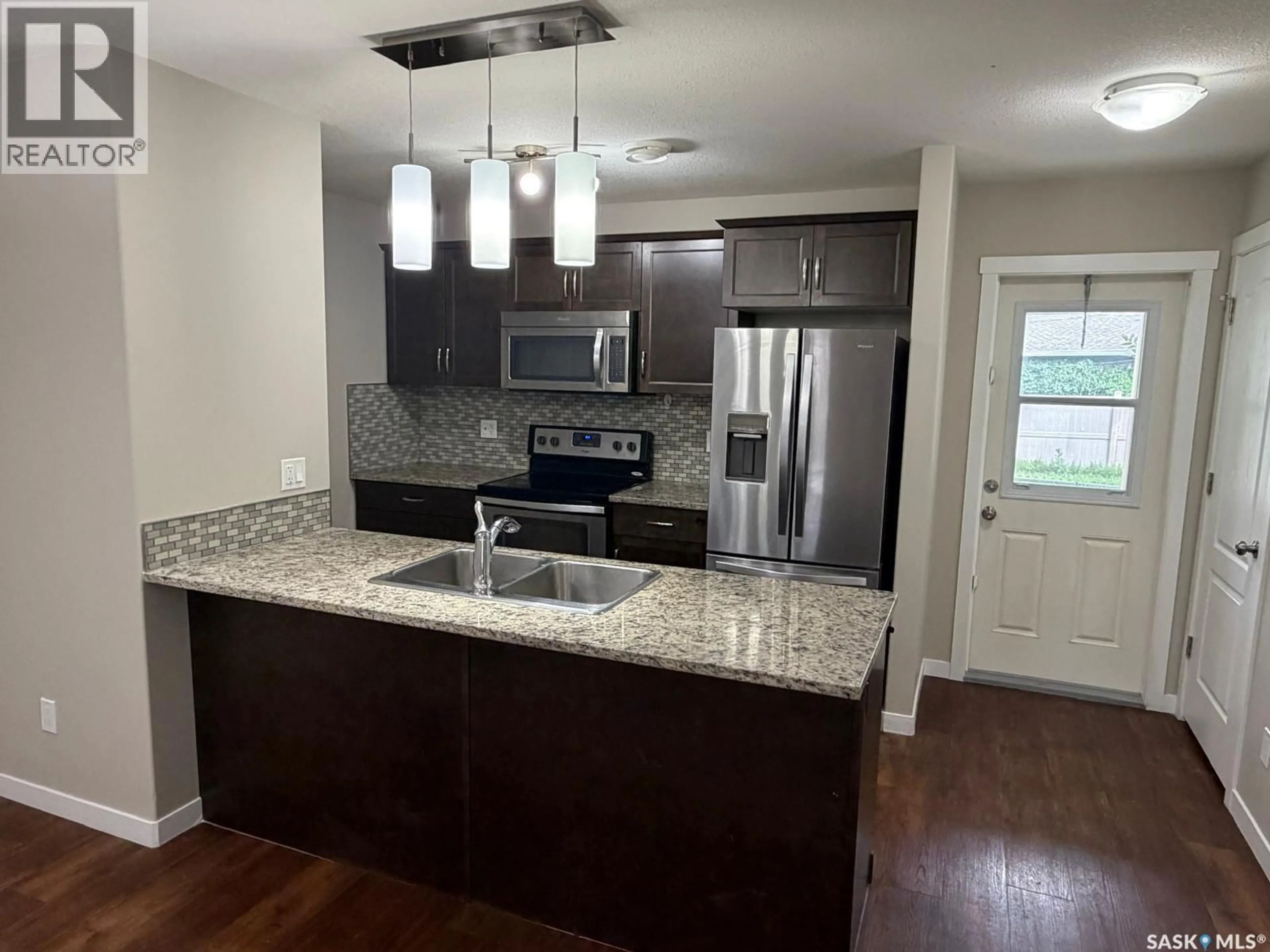Open concept kitchen, unknown for 604 - 3440 AVONHURST DRIVE, Regina Saskatchewan S4R2E1