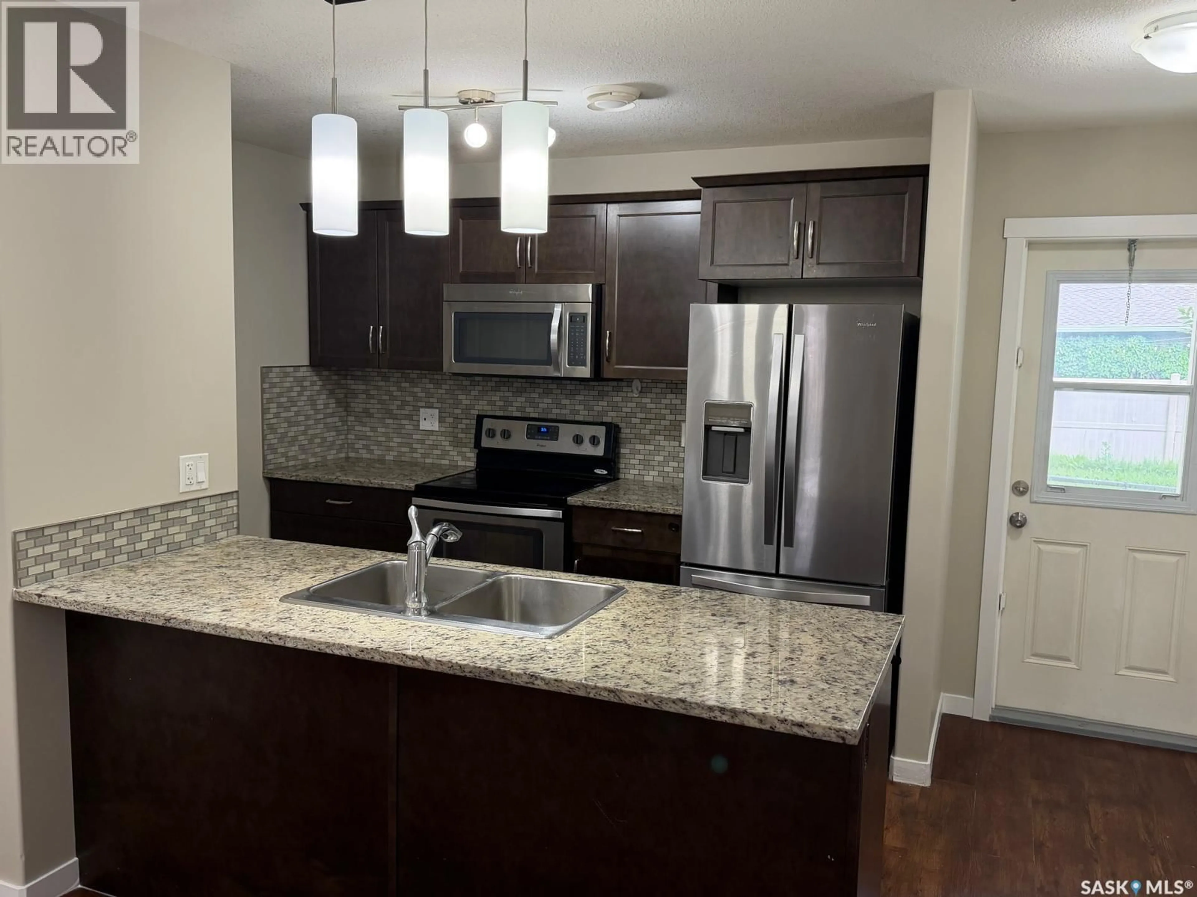 Open concept kitchen, unknown for 604 - 3440 AVONHURST DRIVE, Regina Saskatchewan S4R2E1