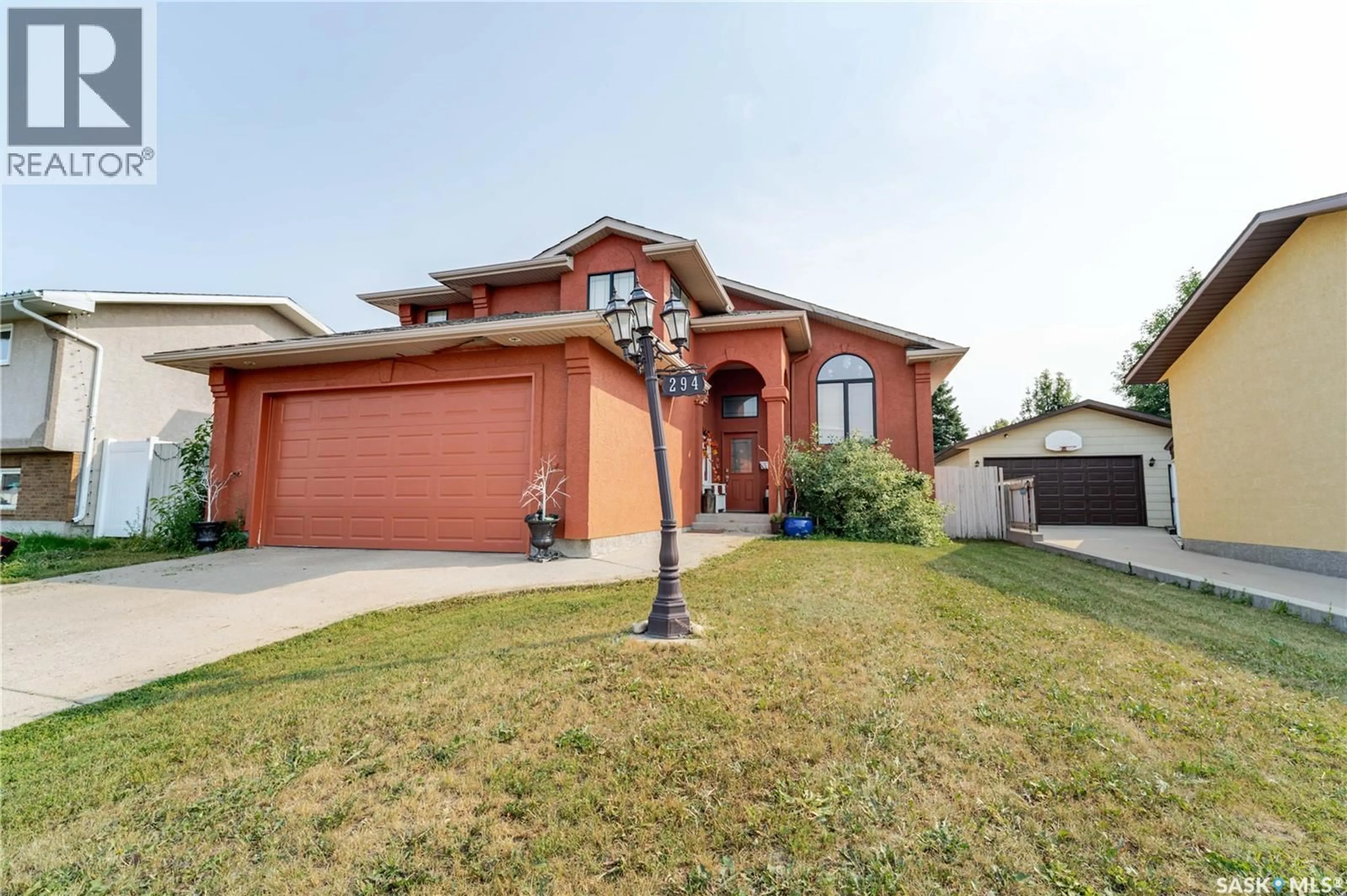 Home with brick exterior material, street for 294 WELLINGTON DRIVE, Moose Jaw Saskatchewan S6K1A4