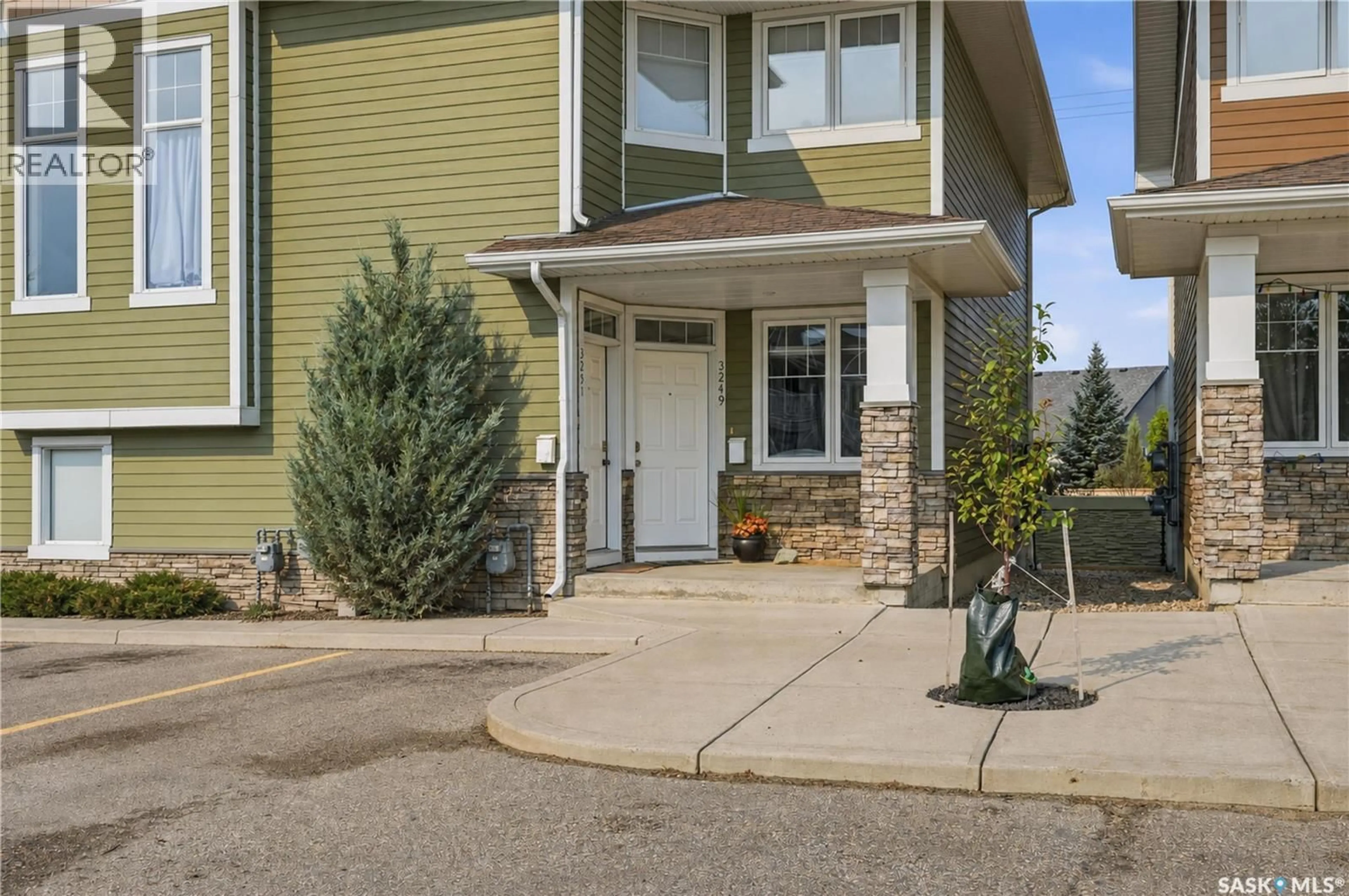 Home with vinyl exterior material, street for 3249 GREEN BANK ROAD, Regina Saskatchewan S4V1P4