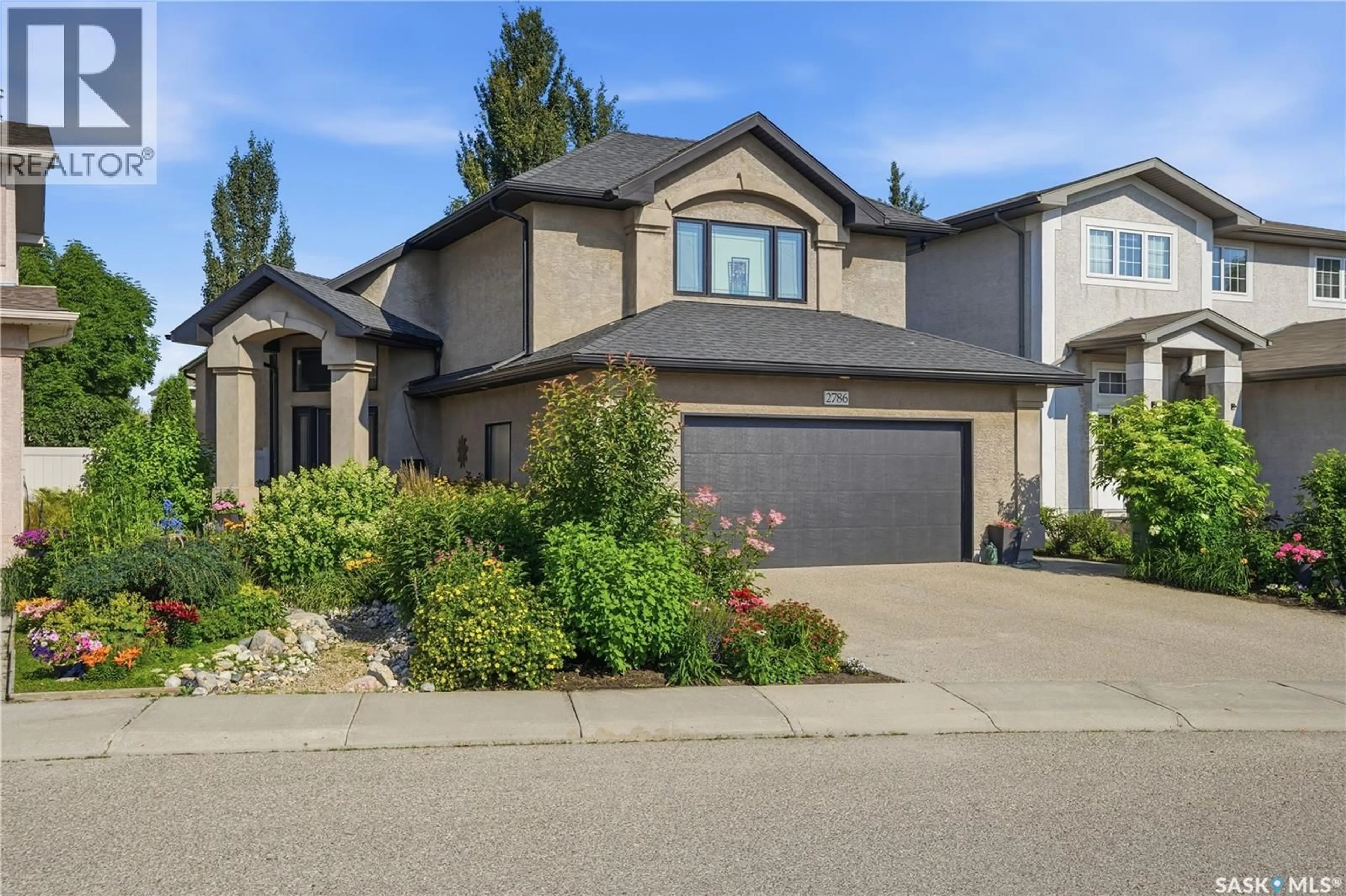 Home with vinyl exterior material, street for 2786 SUNNINGHILL CRESCENT, Regina Saskatchewan S4V0N7