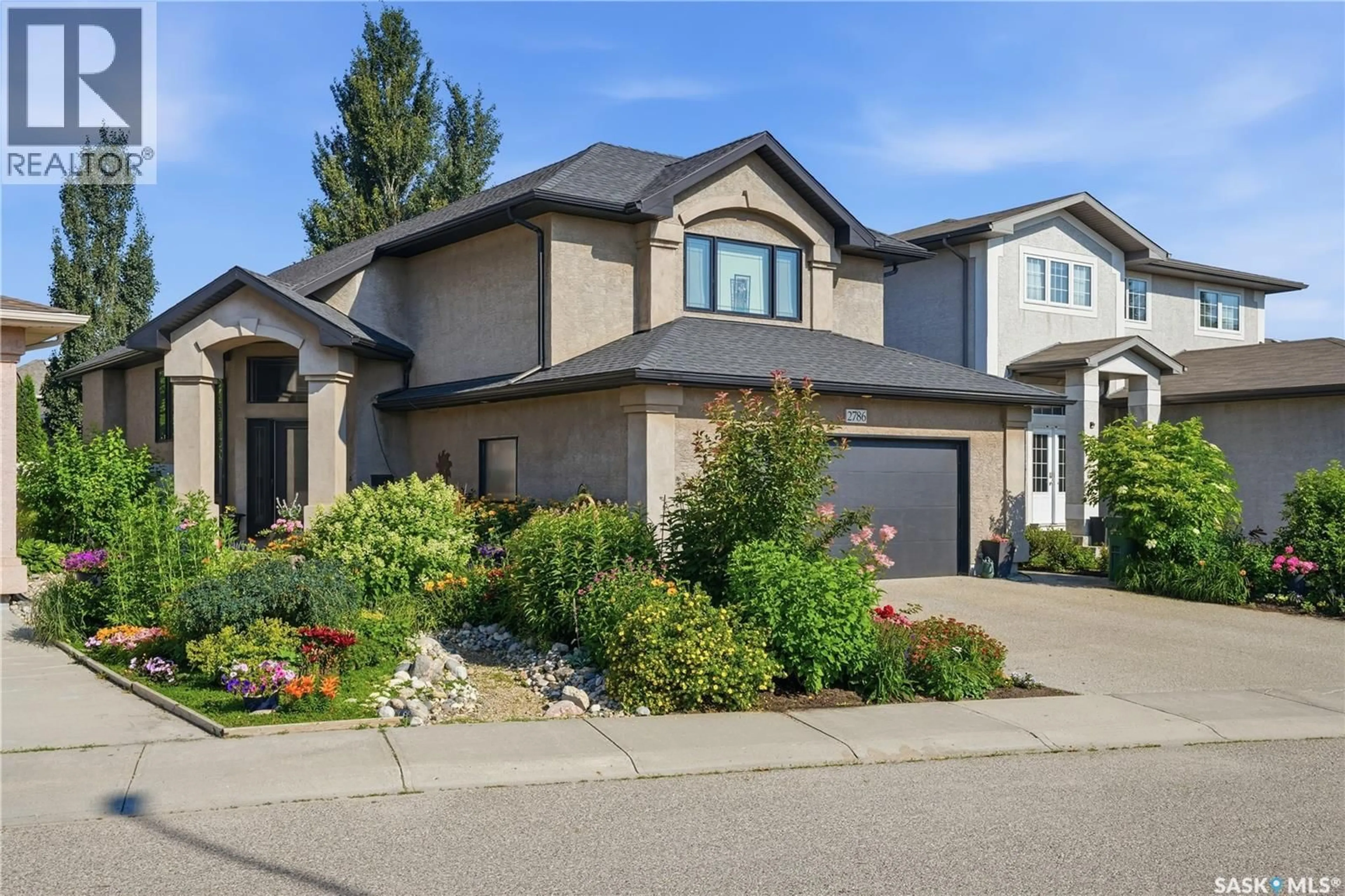 Home with vinyl exterior material, street for 2786 SUNNINGHILL CRESCENT, Regina Saskatchewan S4V0N7