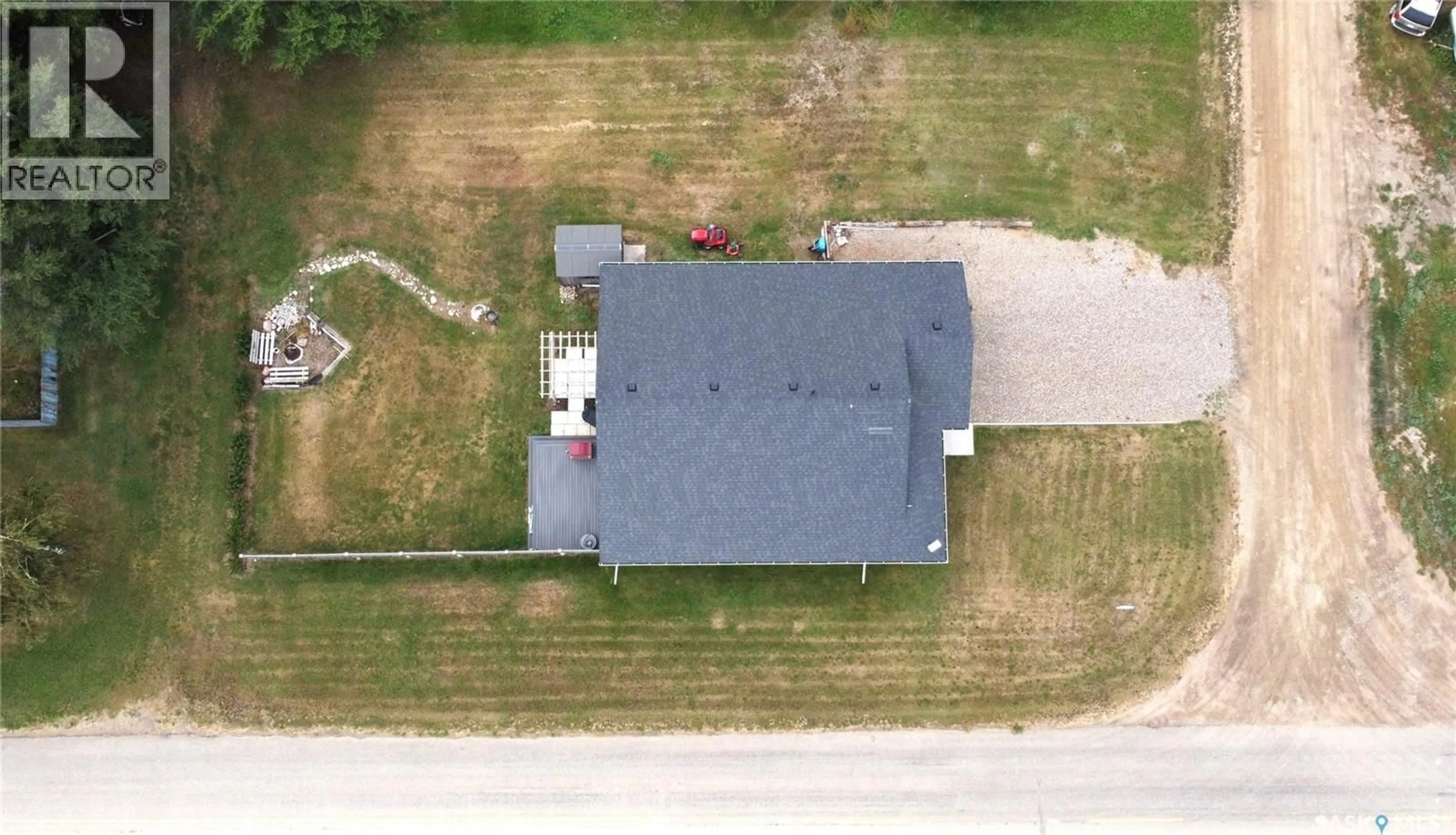 A pic from outside/outdoor area/front of a property/back of a property/a pic from drone, building for 203 BROADWAY AVENUE, Broderick Saskatchewan S0H0L0