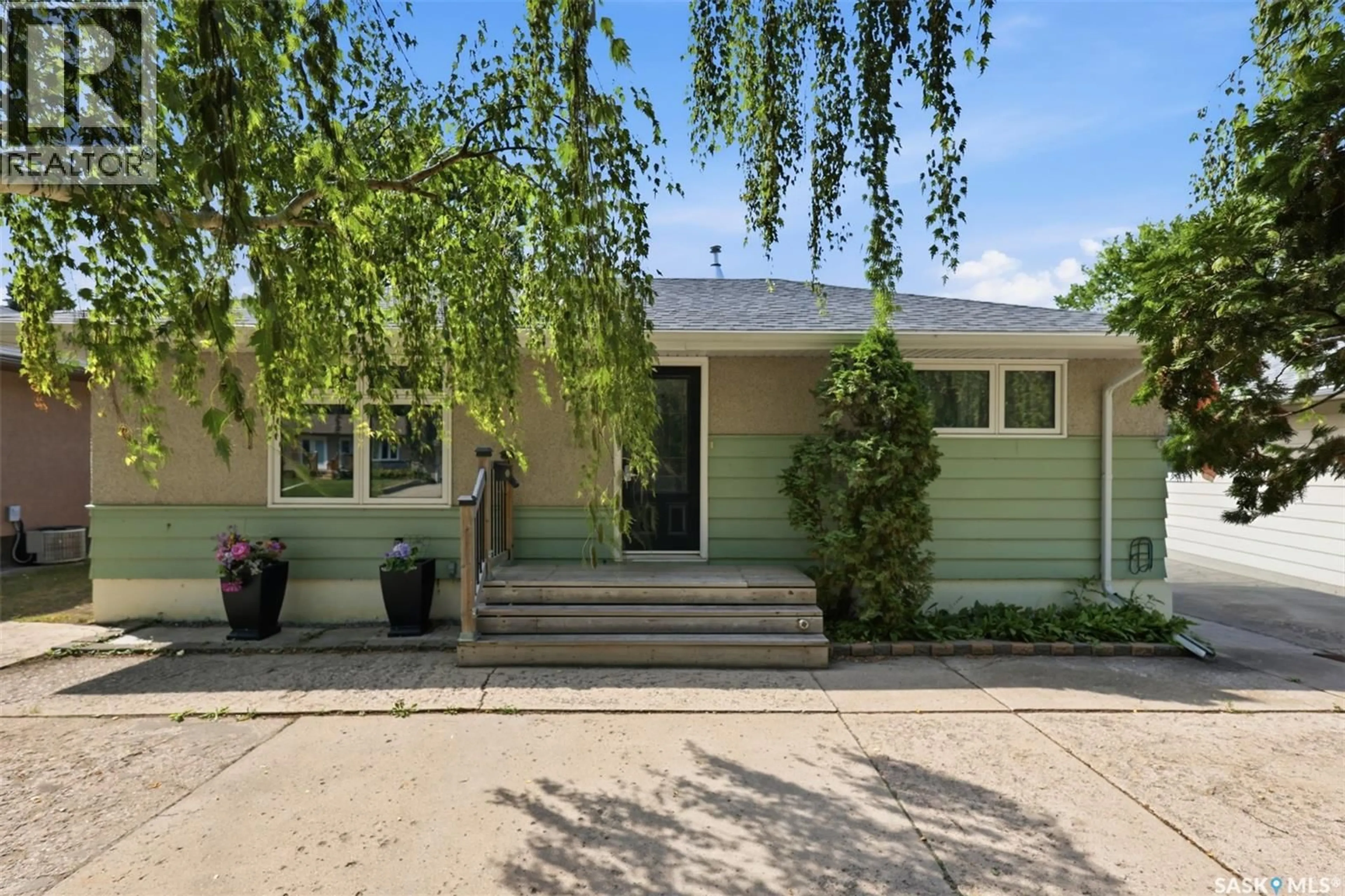 Home with vinyl exterior material, street for 131 OTTAWA AVENUE, Saskatoon Saskatchewan S7M3L4