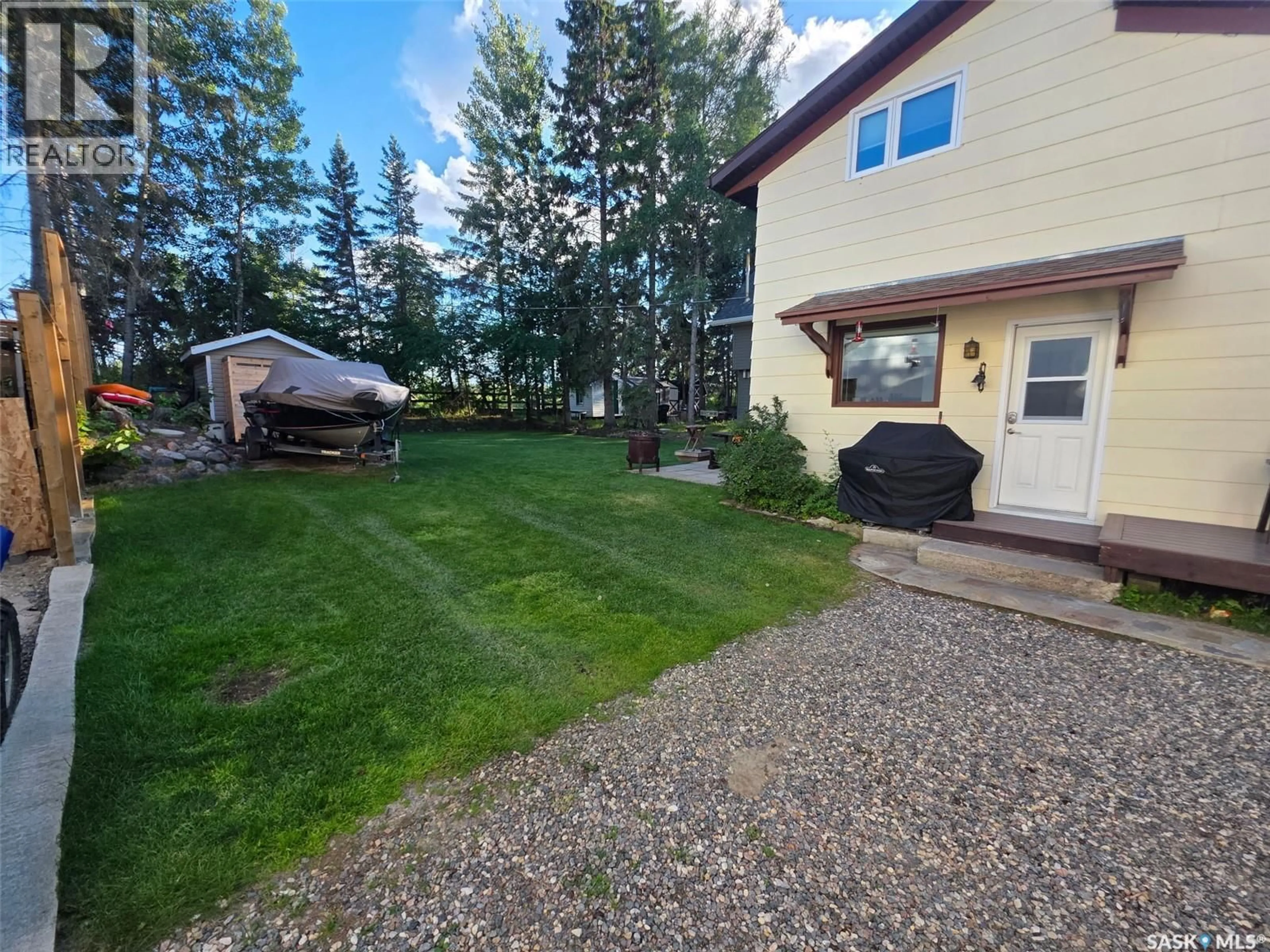 A pic from outside/outdoor area/front of a property/back of a property/a pic from drone, unknown for 14 LAKESHORE DRIVE, Candle Lake Saskatchewan S0J3E0