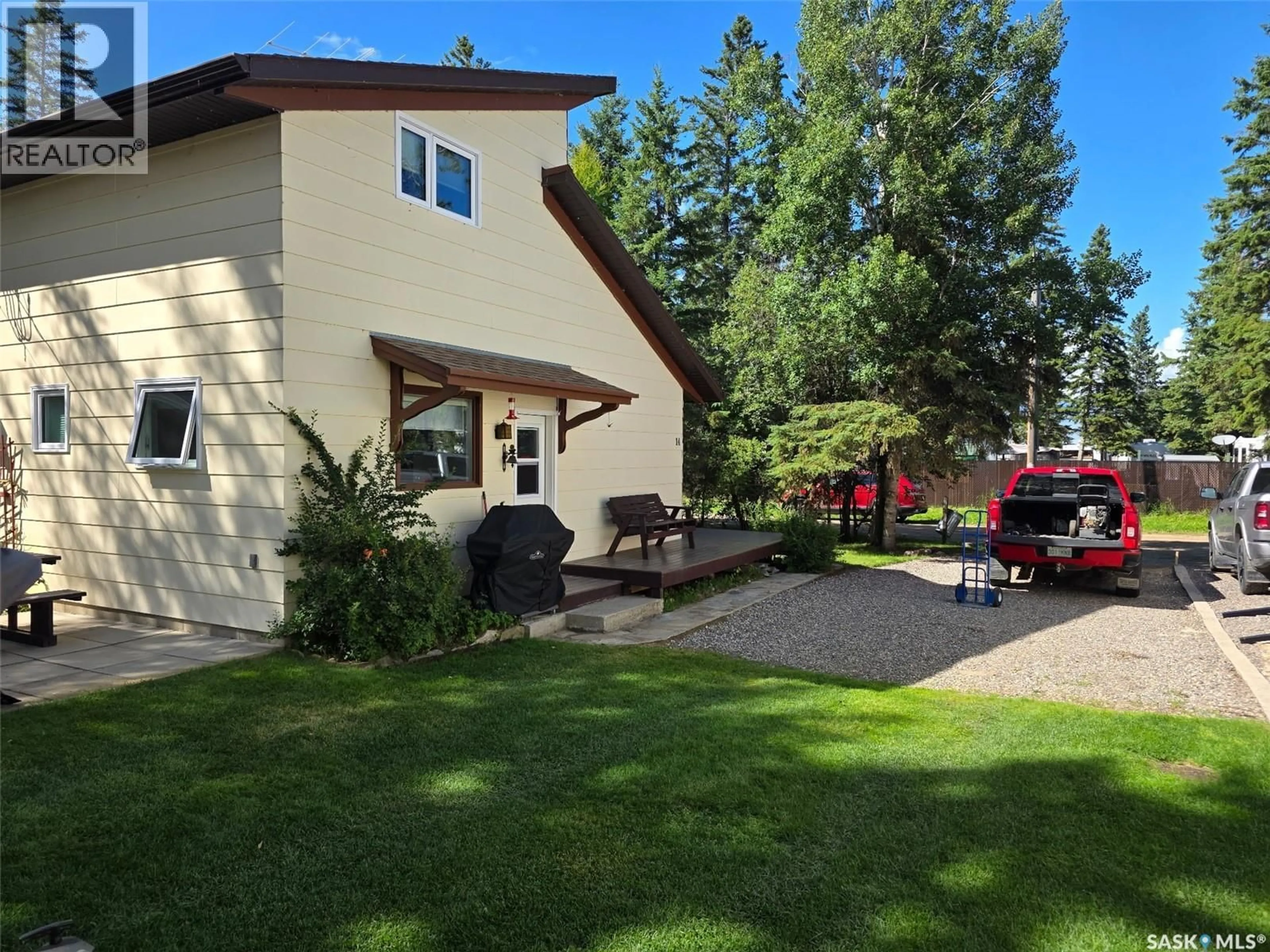 A pic from outside/outdoor area/front of a property/back of a property/a pic from drone, unknown for 14 LAKESHORE DRIVE, Candle Lake Saskatchewan S0J3E0