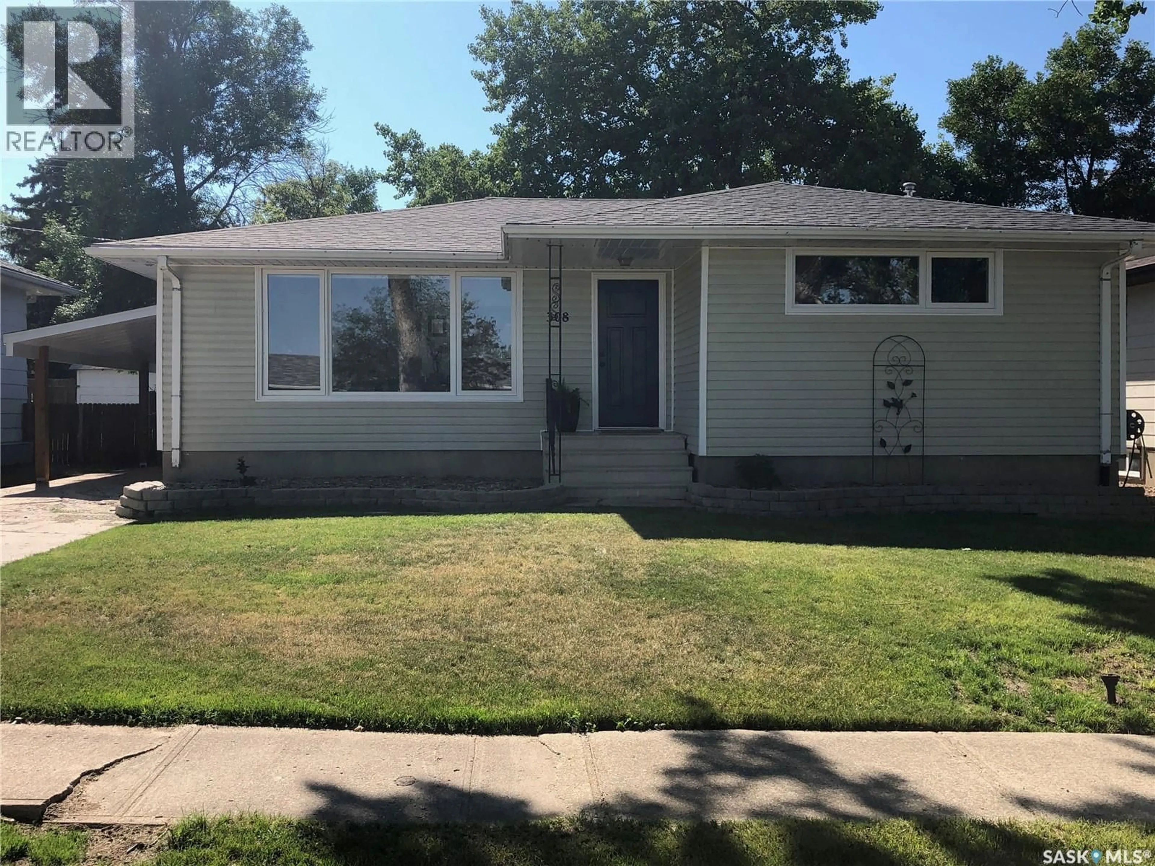 Home with vinyl exterior material, street for 308 SHAW STREET, Herbert Saskatchewan S0H2A0
