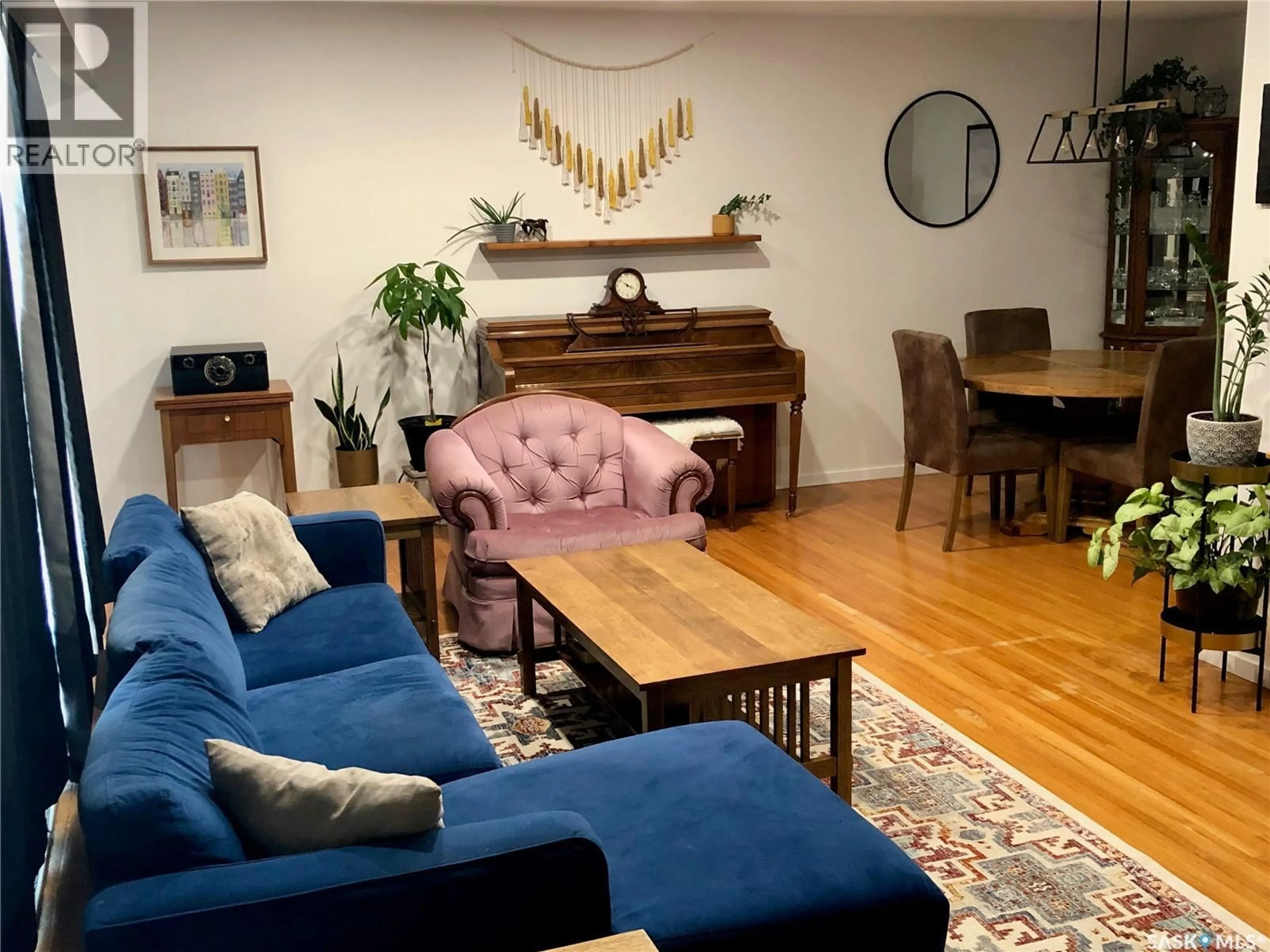 Living room with furniture, wood/laminate floor for 308 SHAW STREET, Herbert Saskatchewan S0H2A0