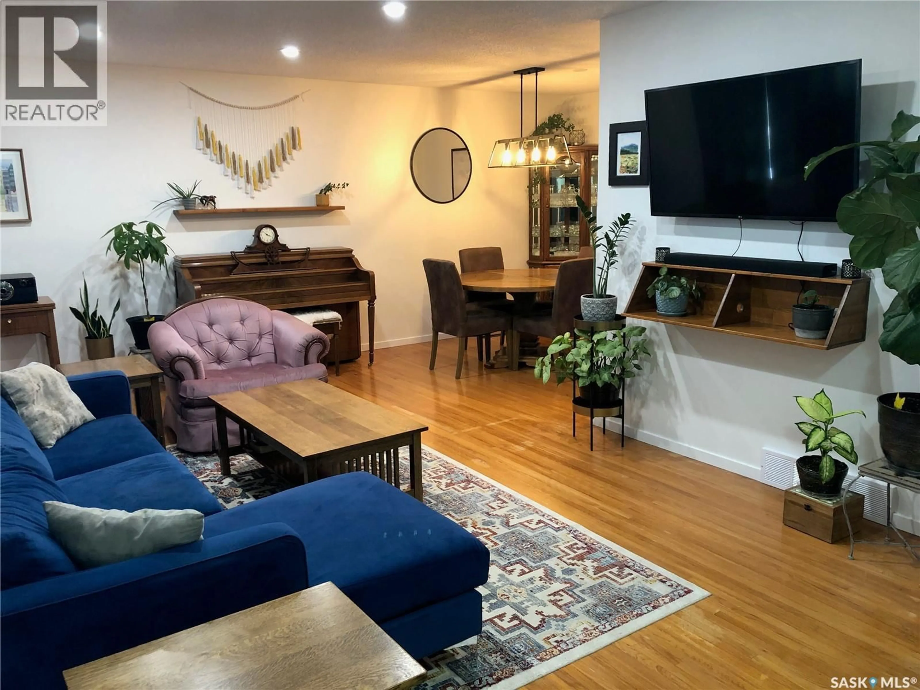 Living room with furniture, wood/laminate floor for 308 SHAW STREET, Herbert Saskatchewan S0H2A0