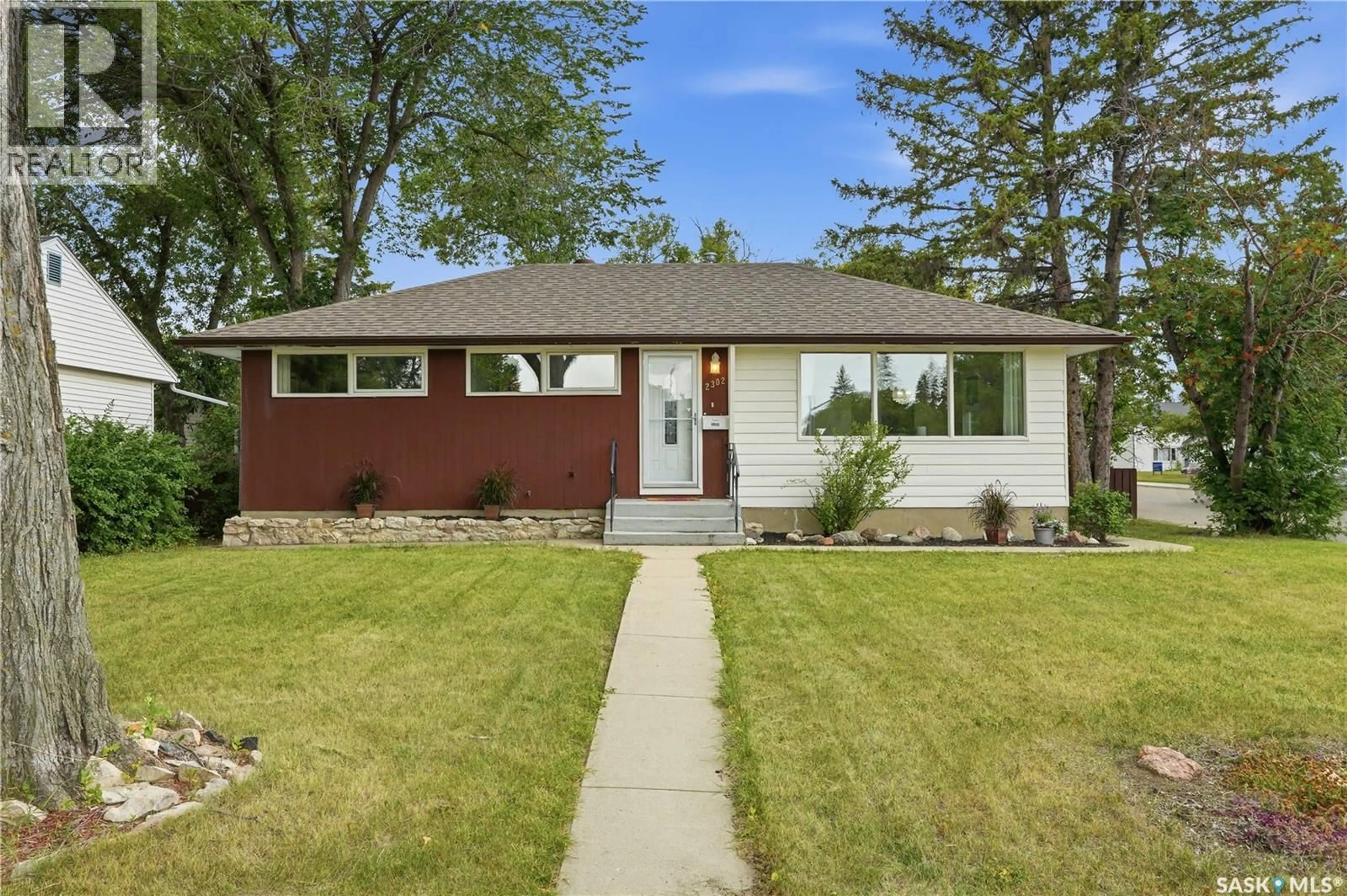 Home with vinyl exterior material, street for 2302 HANOVER AVENUE, Saskatoon Saskatchewan S7J1E6