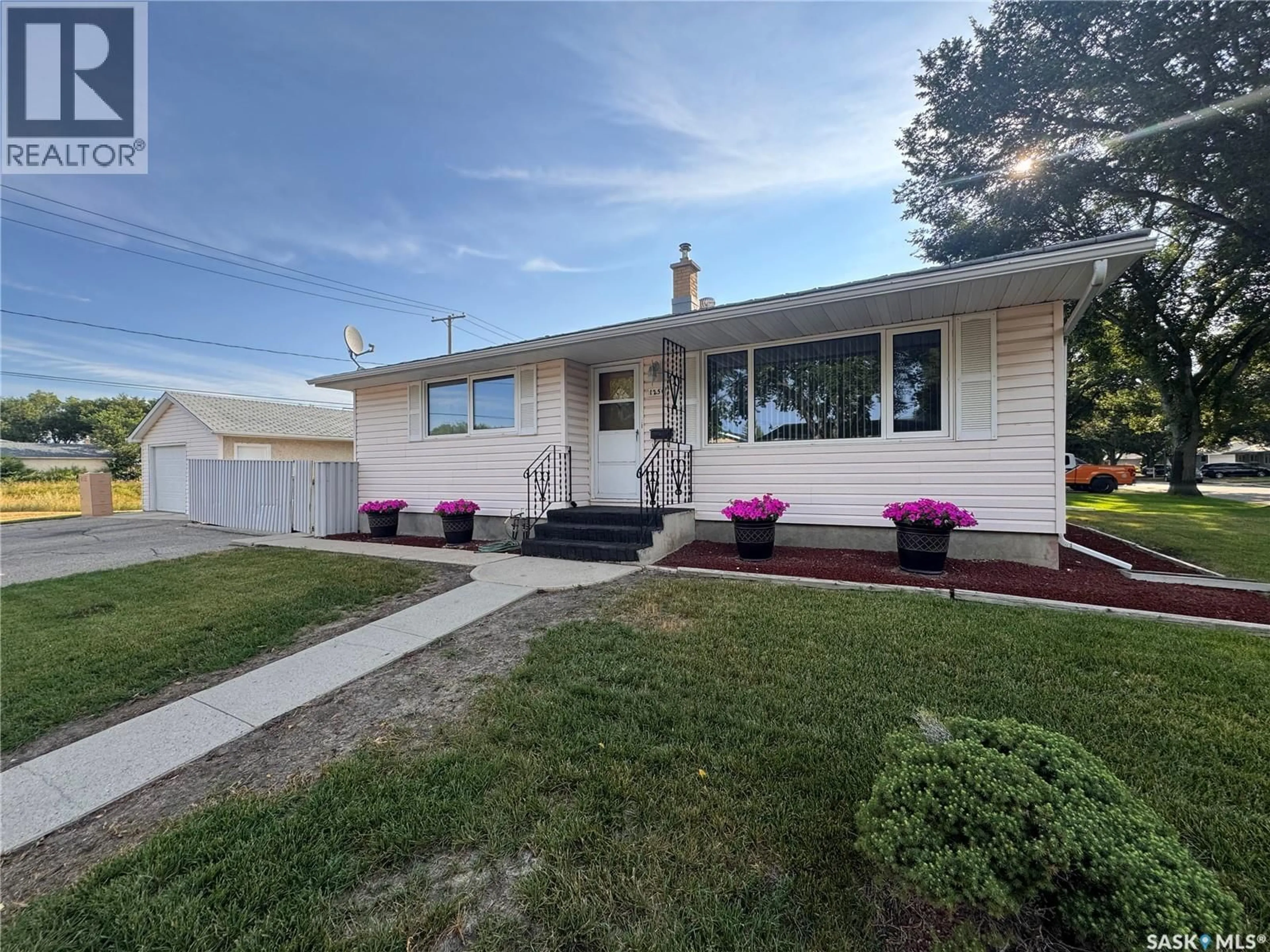 Home with vinyl exterior material, street for 125 GARNET STREET, Regina Saskatchewan S4R3S7