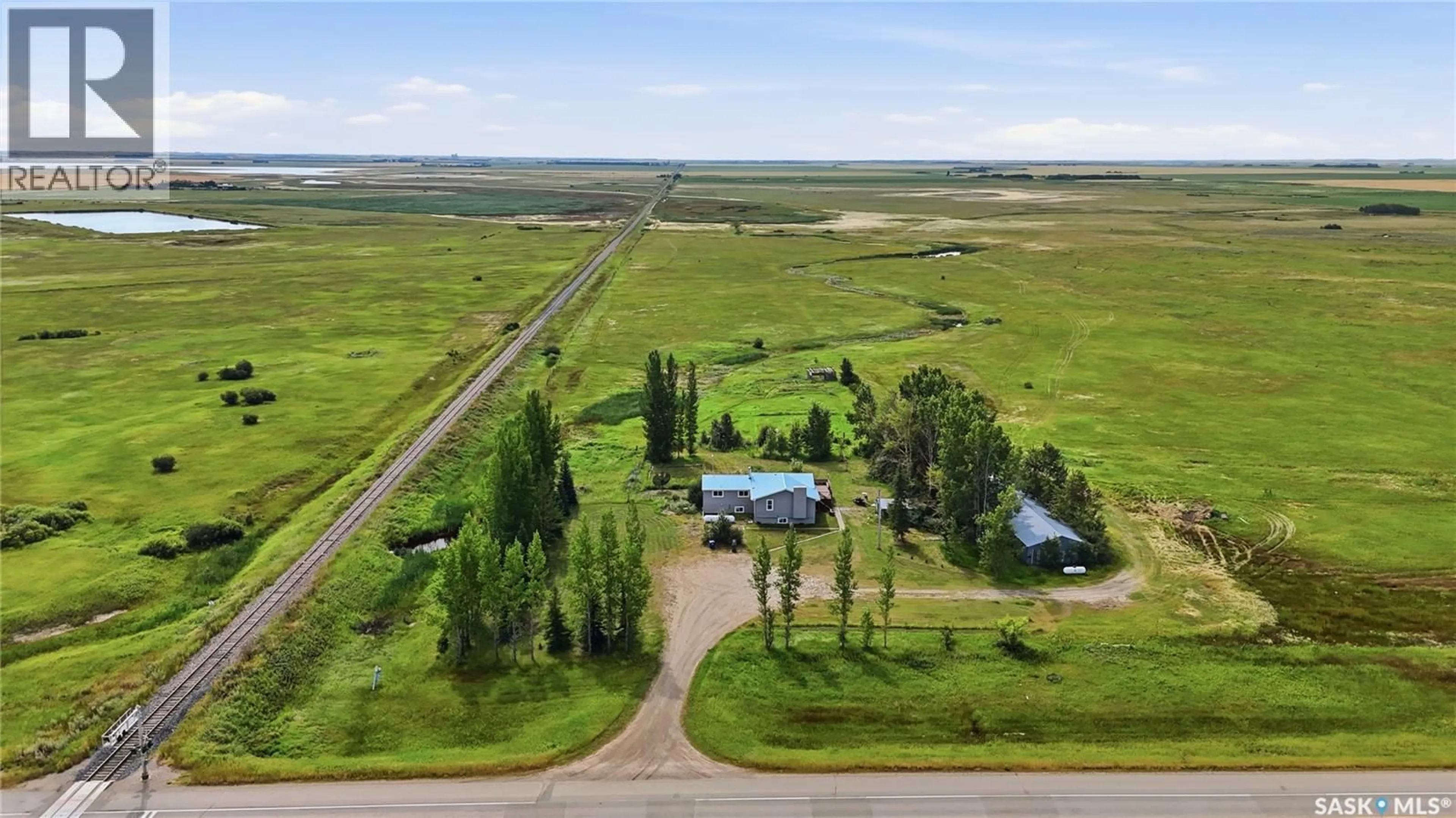 A pic from outside/outdoor area/front of a property/back of a property/a pic from drone, water/lake/river/ocean view for PERRON ACREAGE, Reford Rm No. 379 Saskatchewan S0K4W0