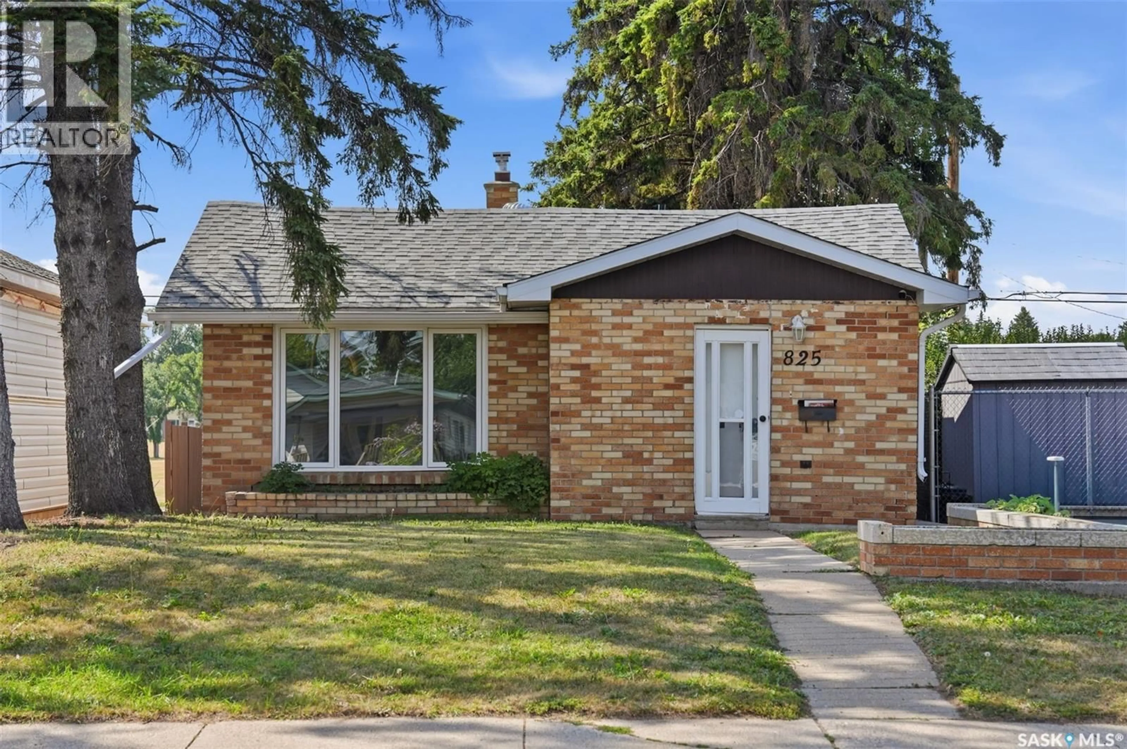 Home with brick exterior material, street for 825 L AVENUE, Saskatoon Saskatchewan S7L2R3