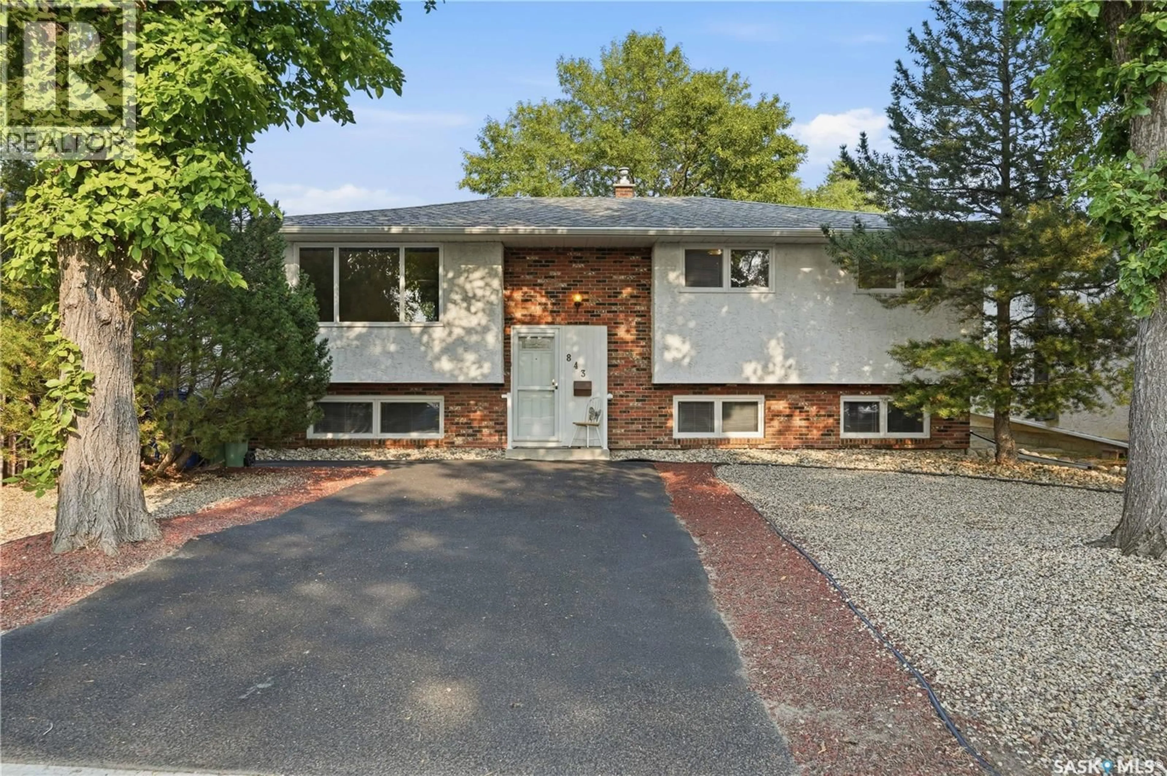 Home with brick exterior material, street for 843 MCINTOSH STREET, Regina Saskatchewan S4R6H1