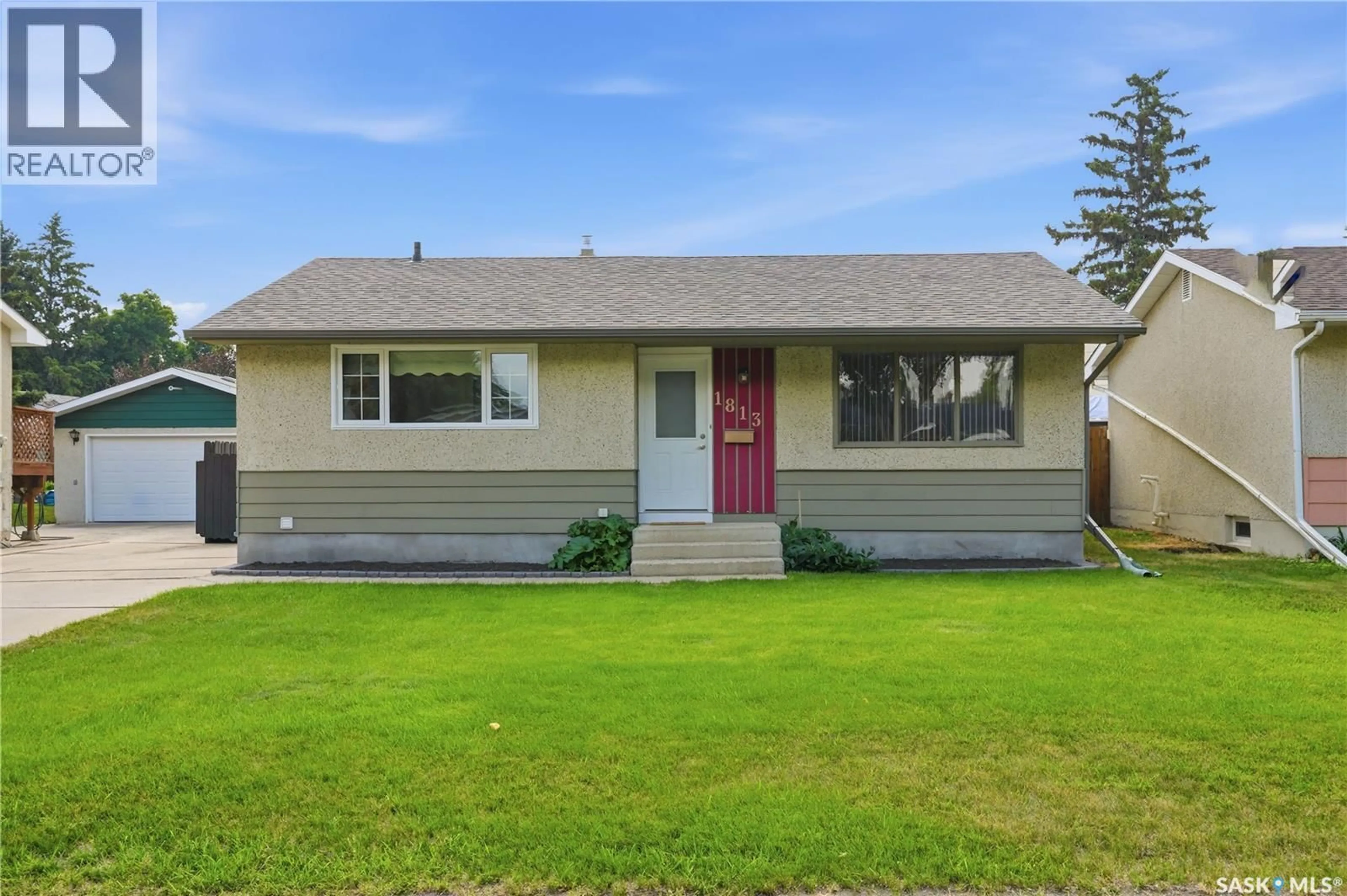 Home with vinyl exterior material, street for 1813 RICHARDSON ROAD, Saskatoon Saskatchewan S7L4B6