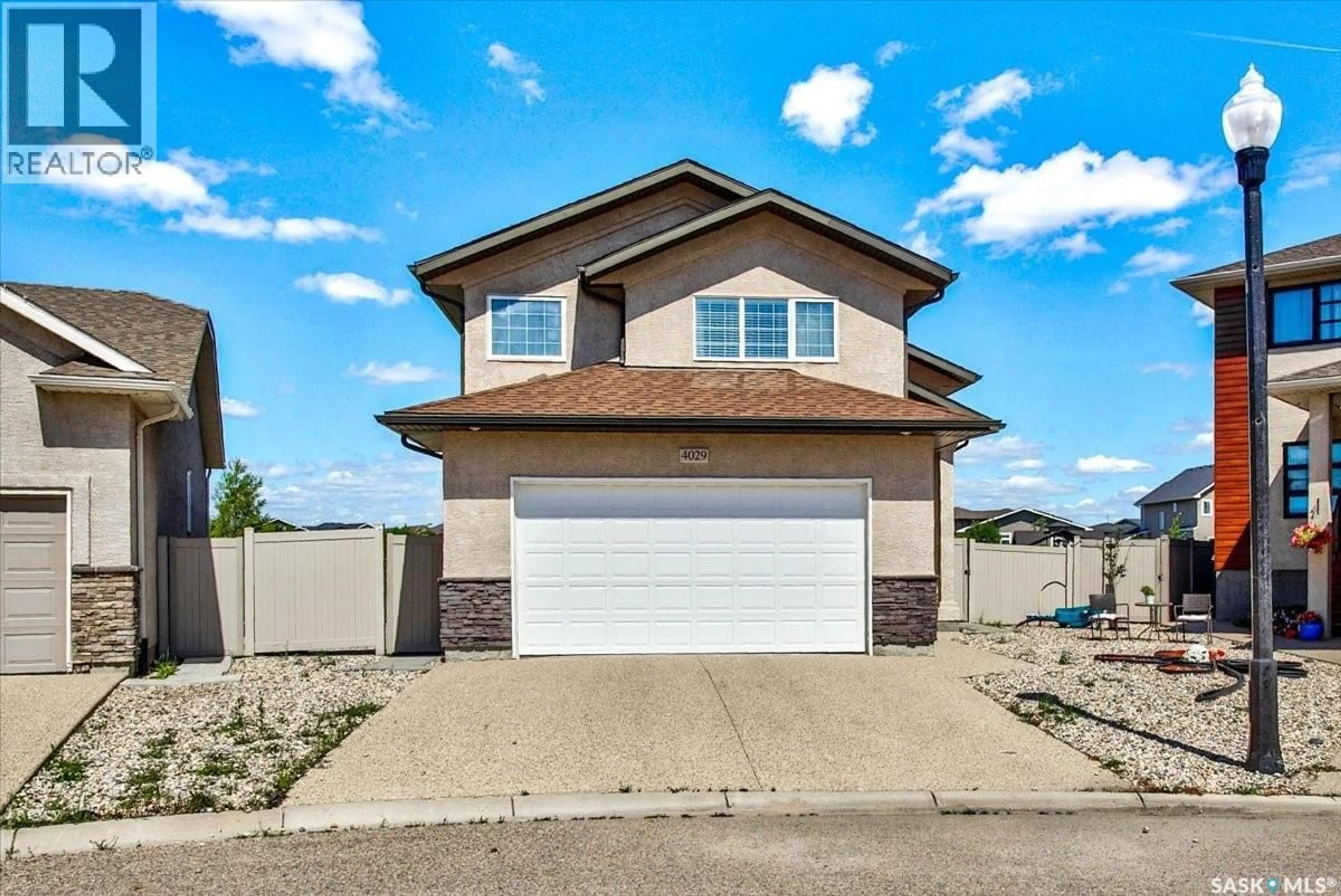 Home with vinyl exterior material, street for 4029 ALTON CRESCENT, Regina Saskatchewan S0G4G0