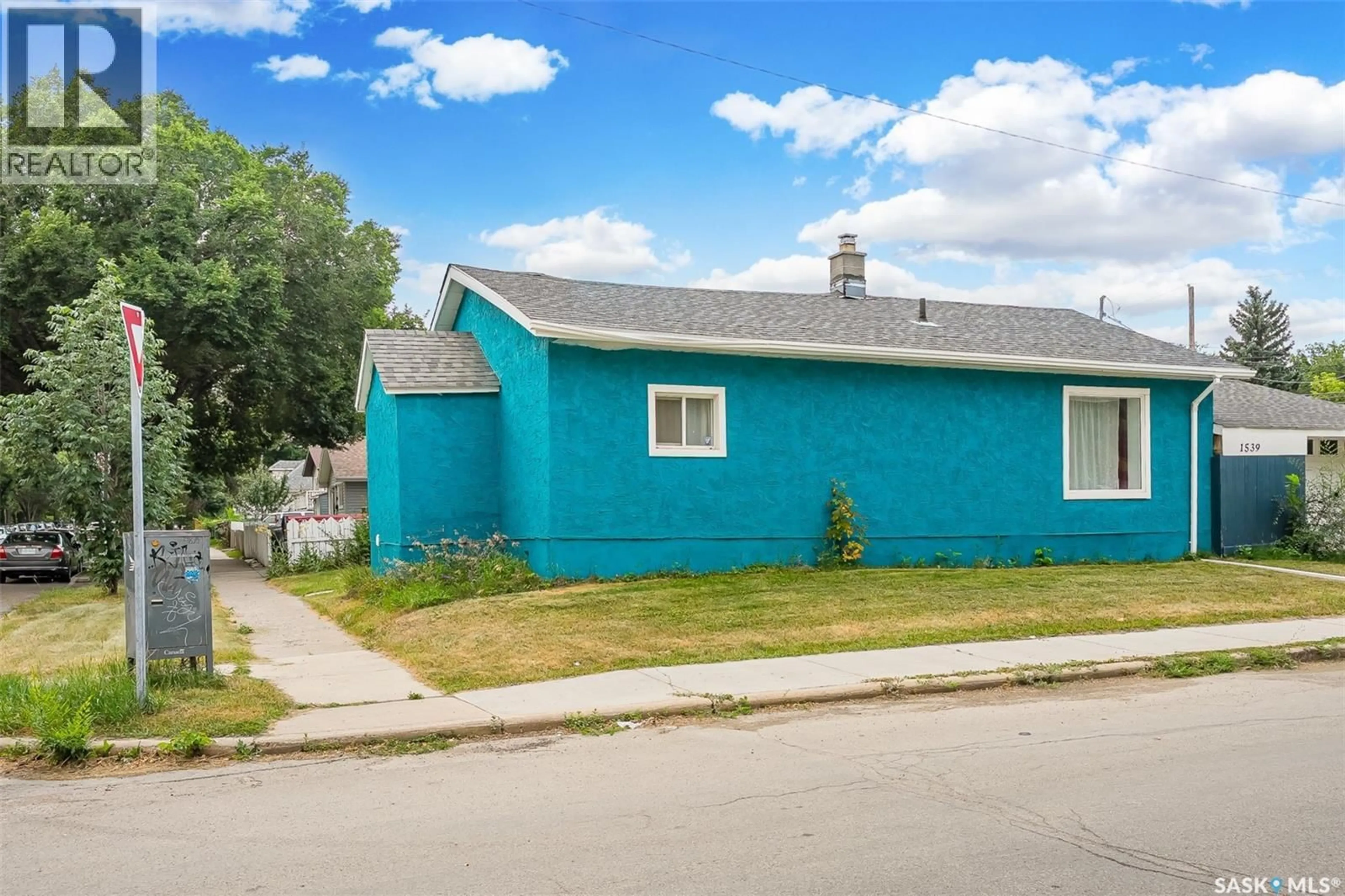 Home with vinyl exterior material, street for 1539 B AVENUE, Saskatoon Saskatchewan S7L1G9