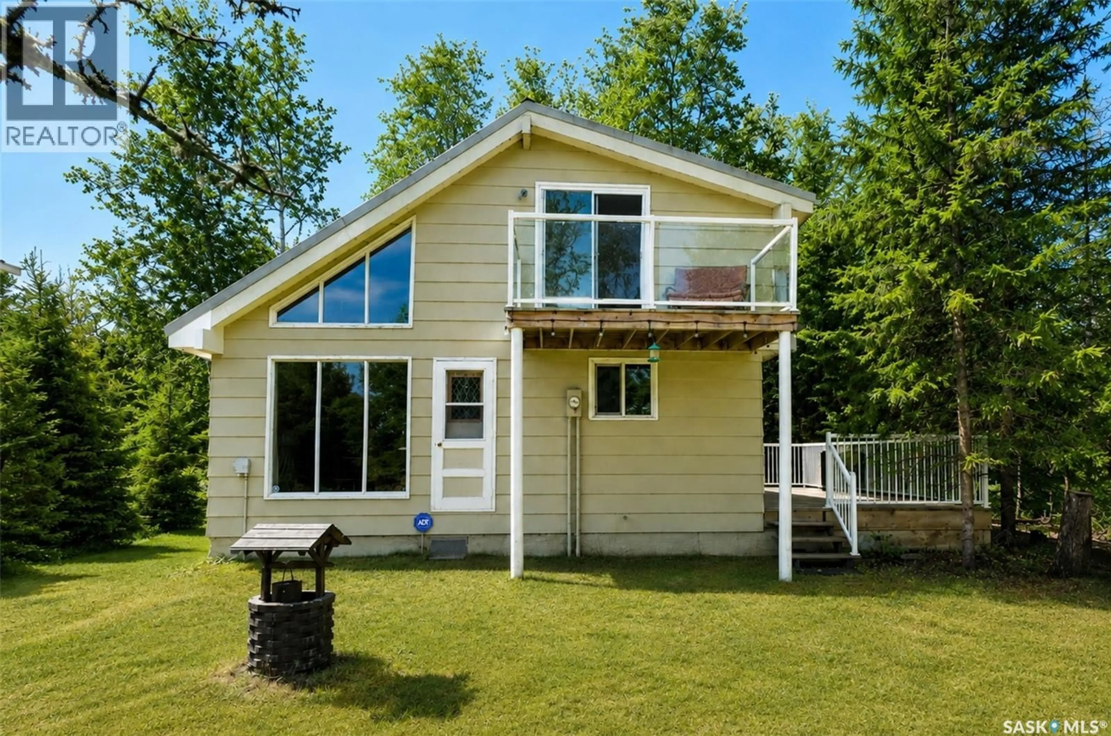 Home with vinyl exterior material, water/lake/river/ocean view for 303 CHRISTEL CRESCENT, Lac des Îles Saskatchewan S0M1A0