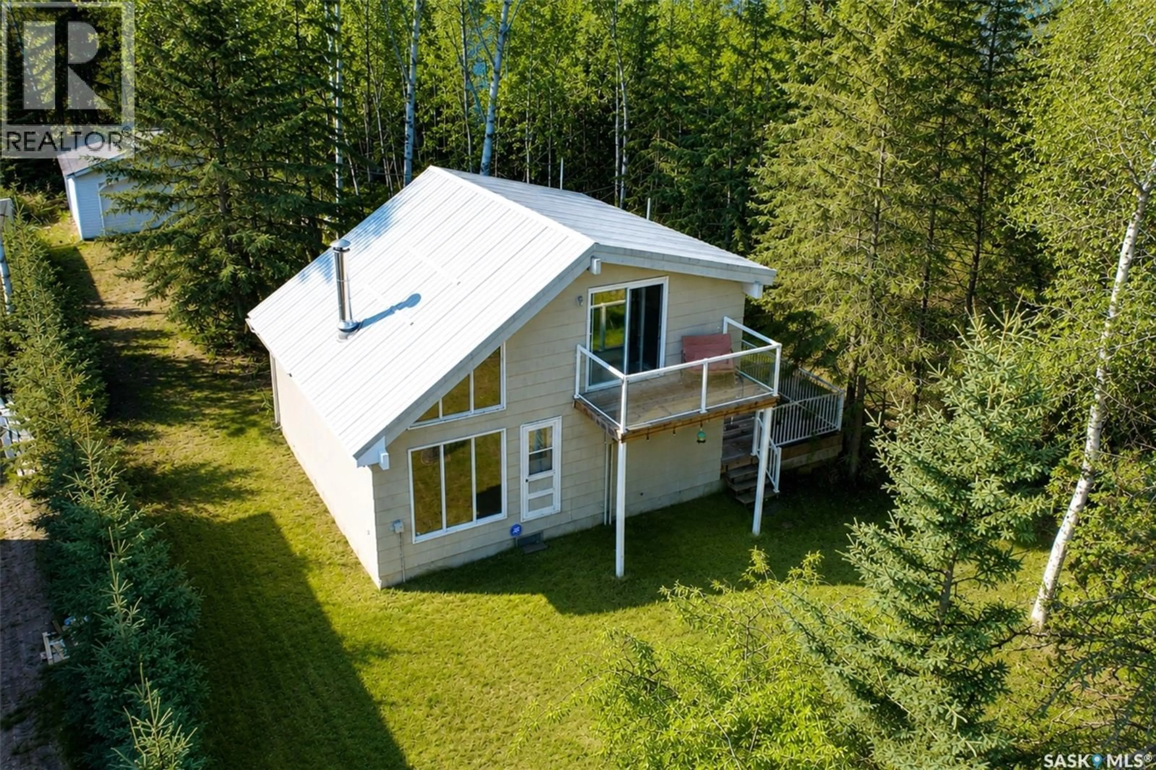 A pic from outside/outdoor area/front of a property/back of a property/a pic from drone, unknown for 303 CHRISTEL CRESCENT, Lac des Îles Saskatchewan S0M1A0