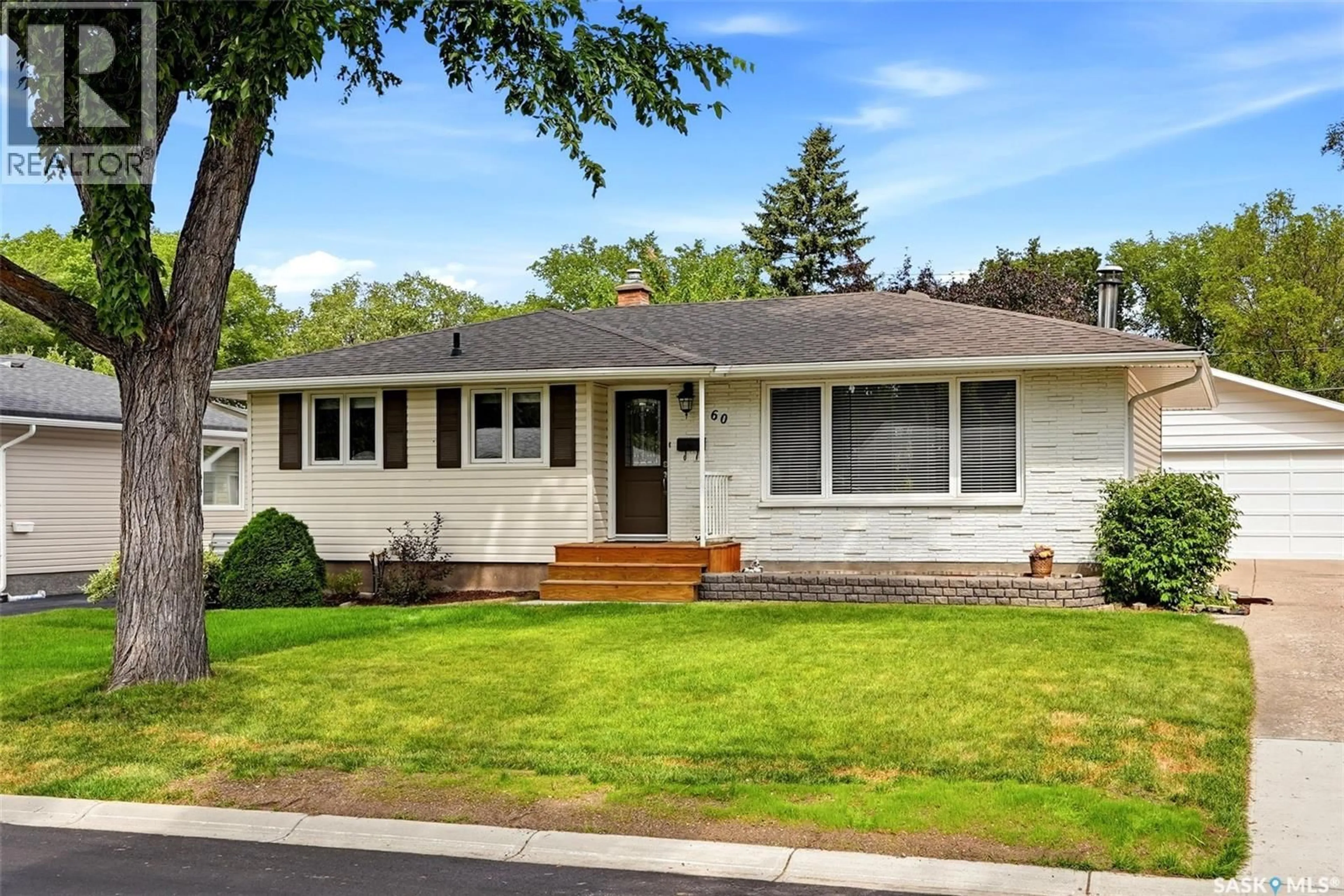 Home with vinyl exterior material, street for 60 GARDINER AVENUE, Regina Saskatchewan S4S4P6