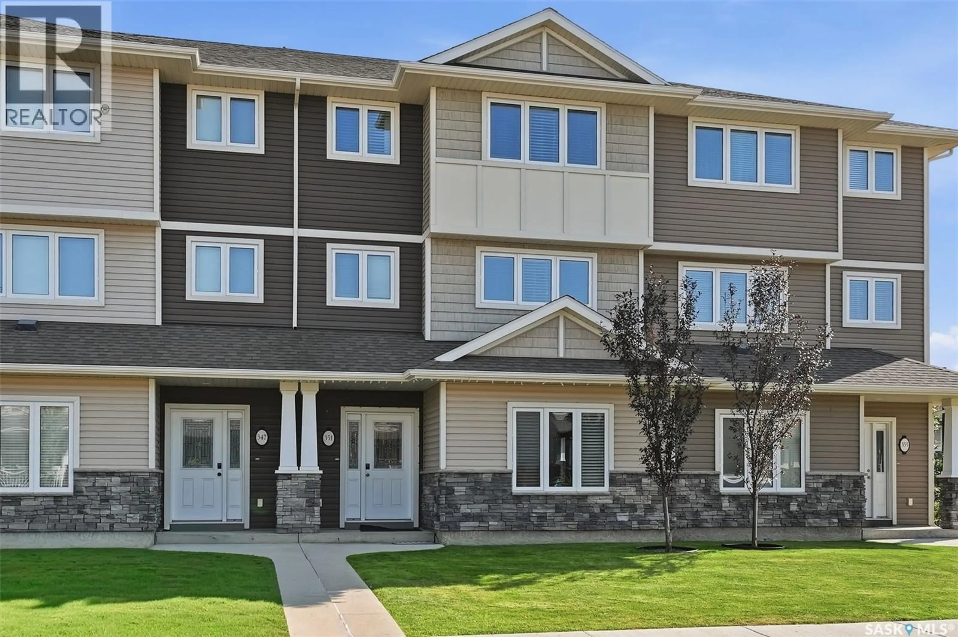 Home with vinyl exterior material, street for 351 PALLISER WAY, Saskatoon Saskatchewan S7L4Y6