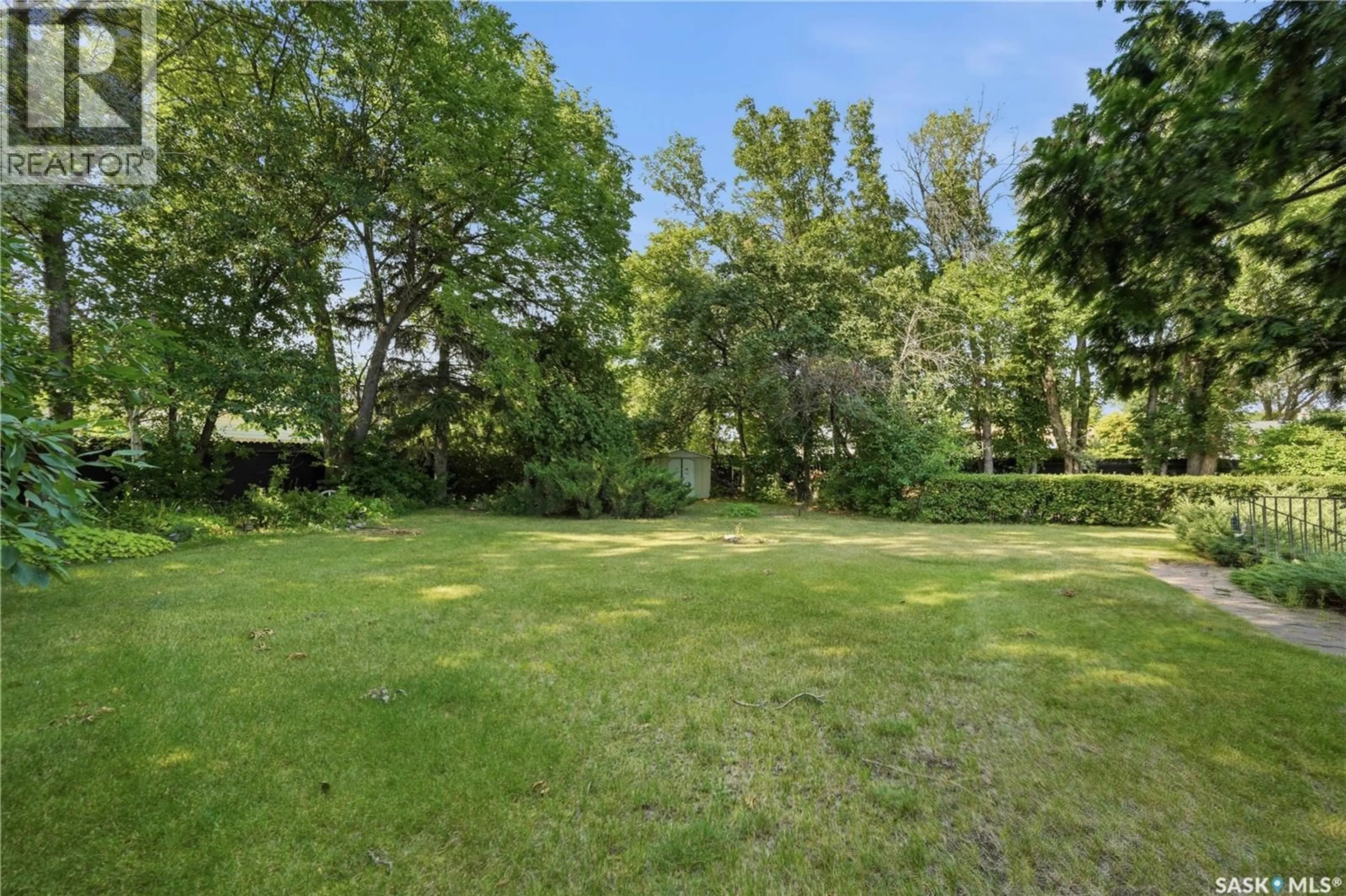 Patio, forest/trees view for 92 WENTWORTH CRESCENT, Saskatoon Saskatchewan S7L4A9