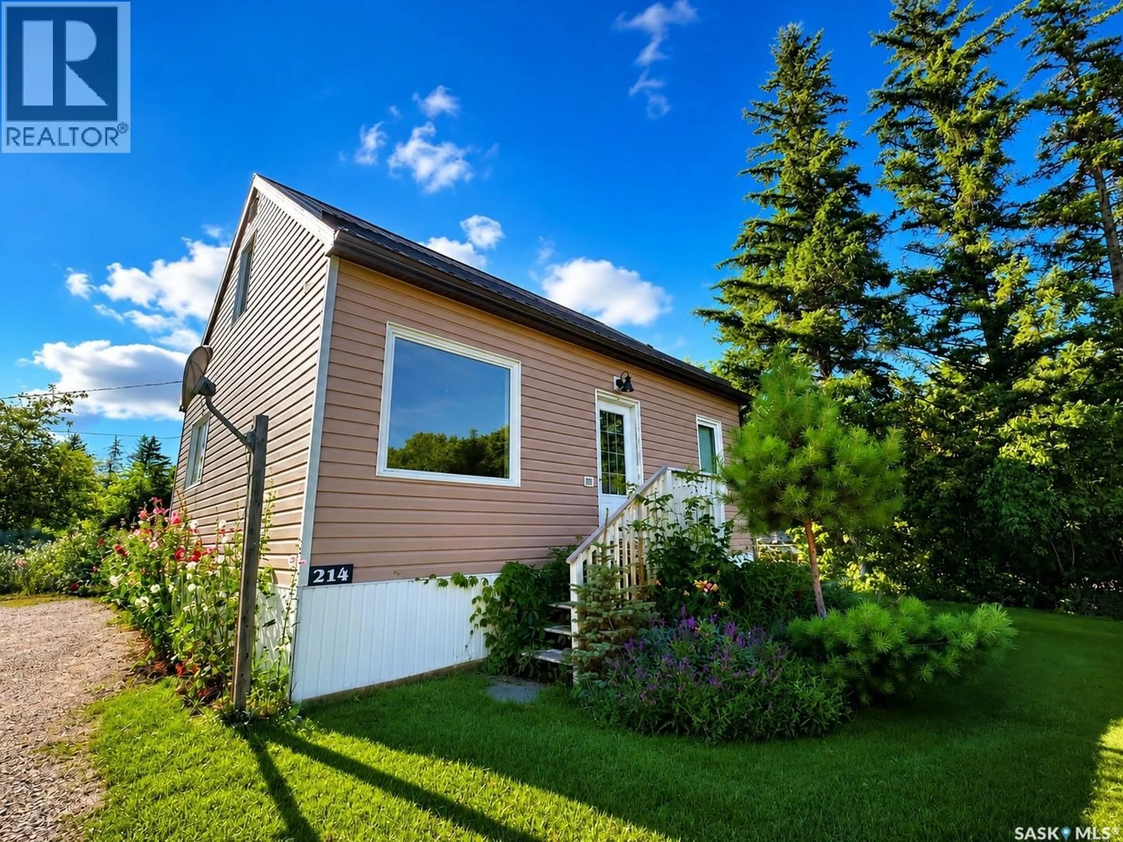 Home with vinyl exterior material, street for 214 BATES STREET, Earl Grey Saskatchewan S0G0J5
