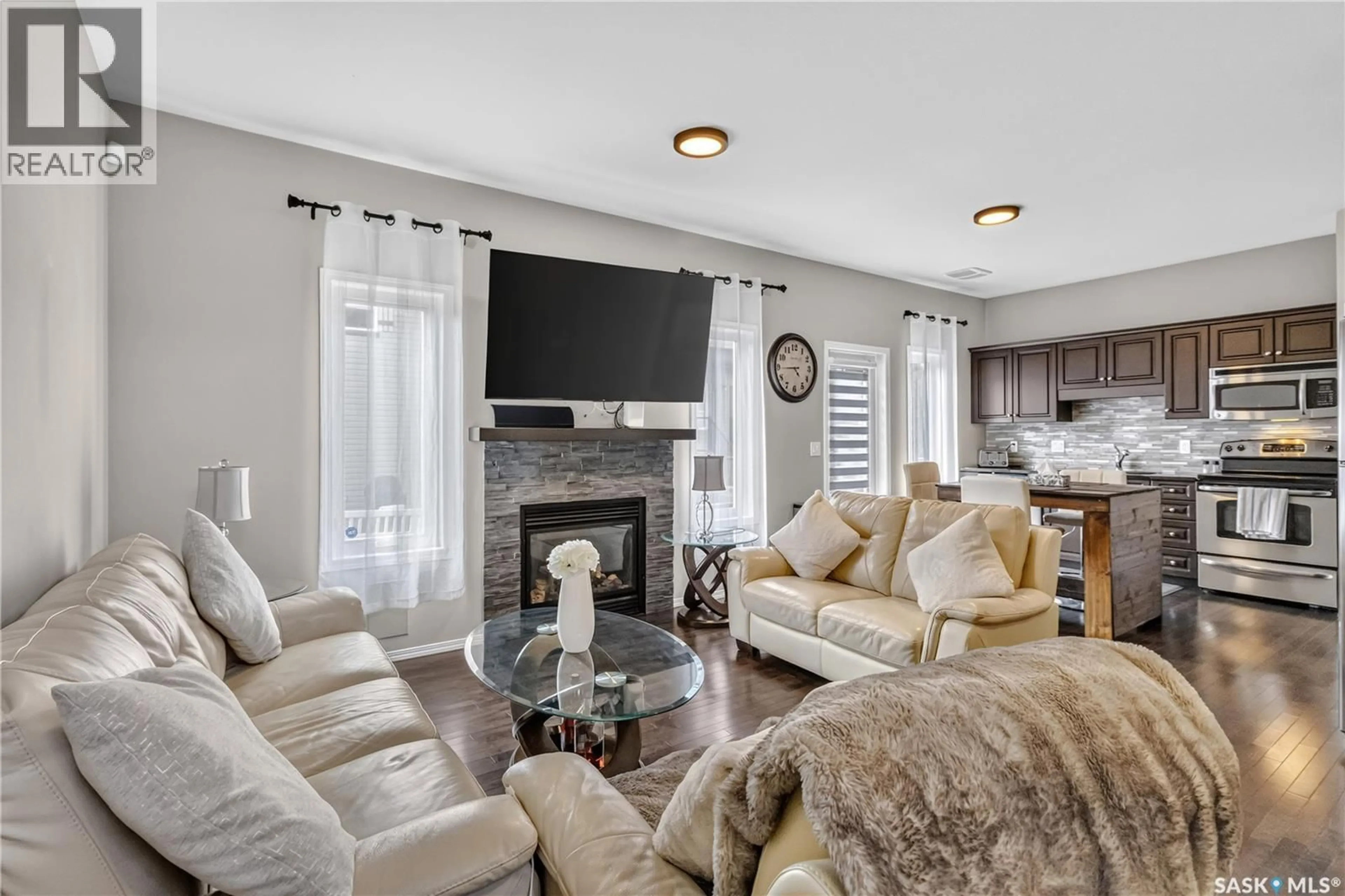 Living room with furniture, unknown for 723 150 LANGLOIS WAY, Saskatoon Saskatchewan S7T1C8