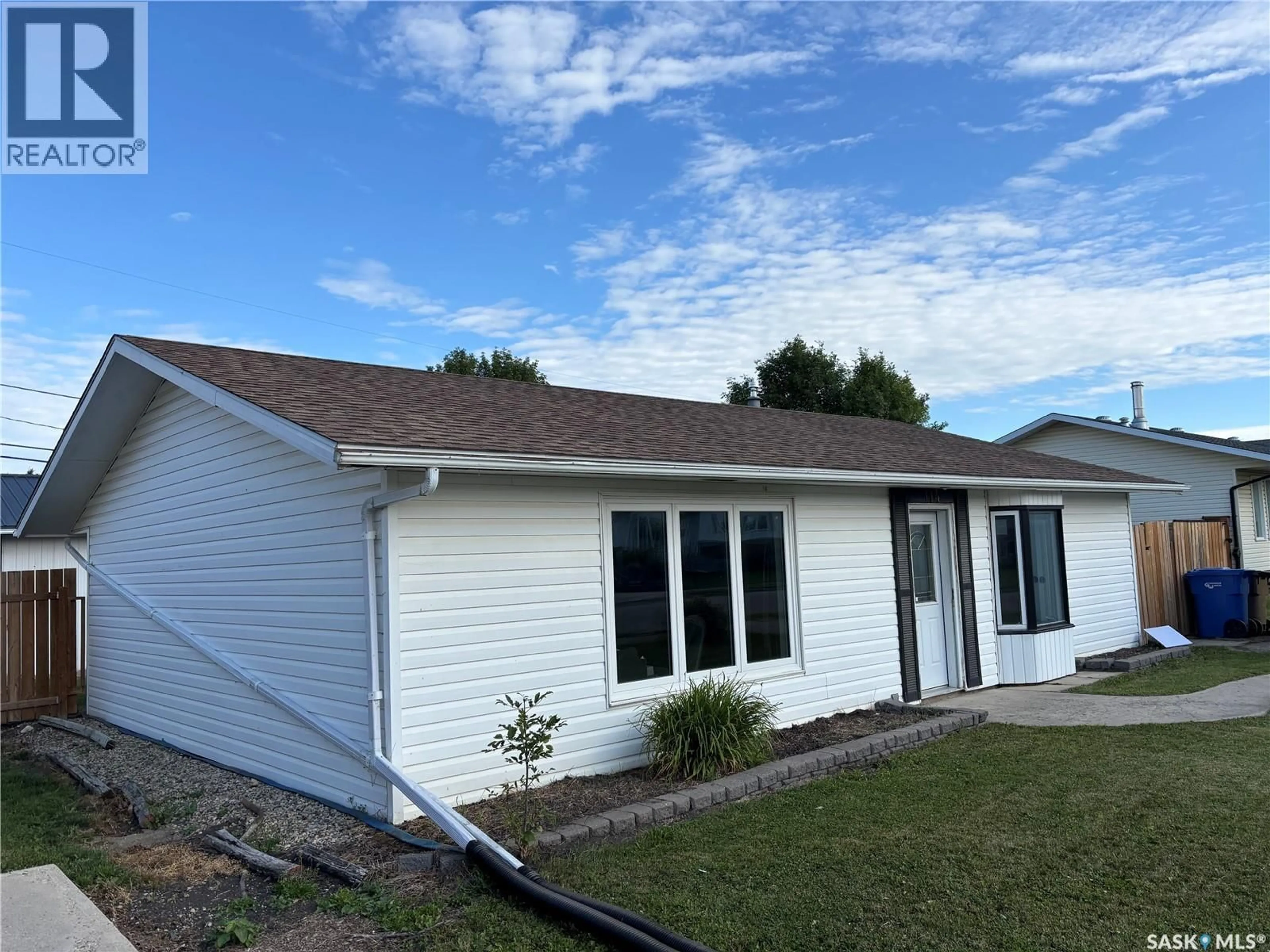 Home with vinyl exterior material, street for 114 SASKATCHEWAN CRESCENT, Kinistino Saskatchewan S0J1H0