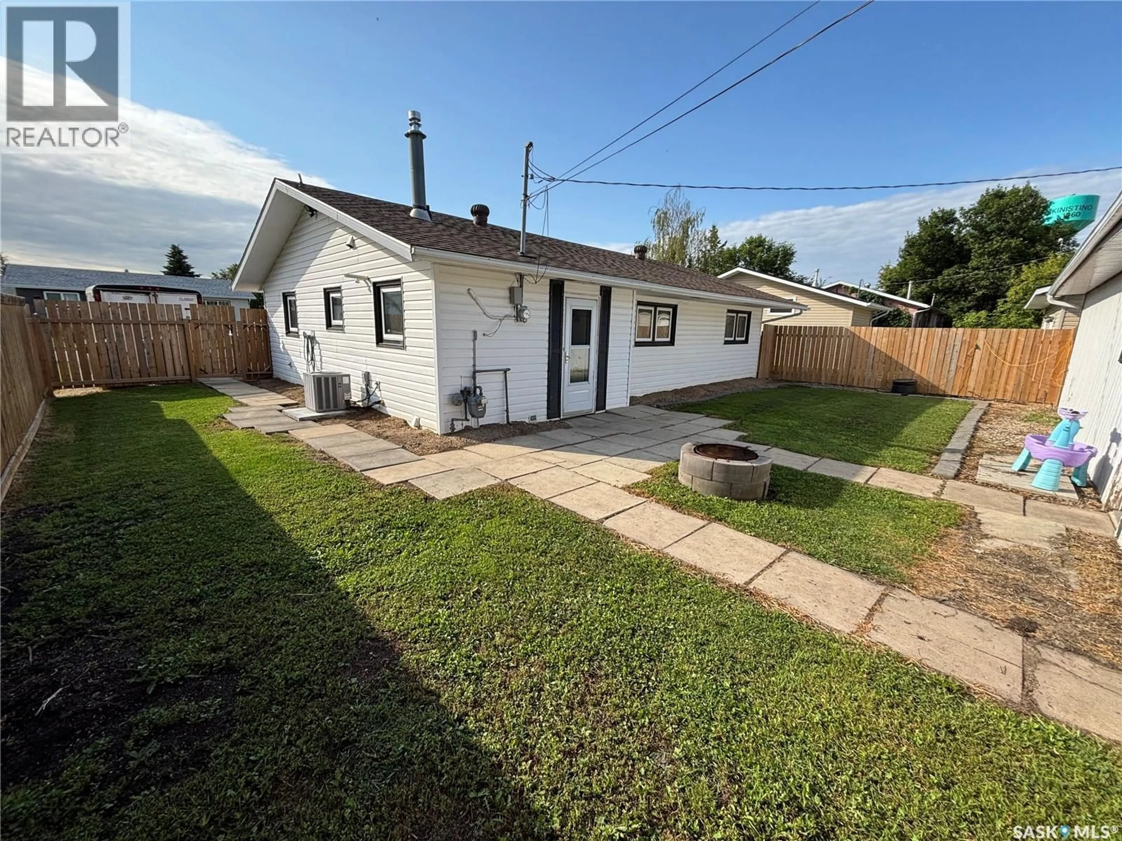 A pic from outside/outdoor area/front of a property/back of a property/a pic from drone, street for 114 SASKATCHEWAN CRESCENT, Kinistino Saskatchewan S0J1H0
