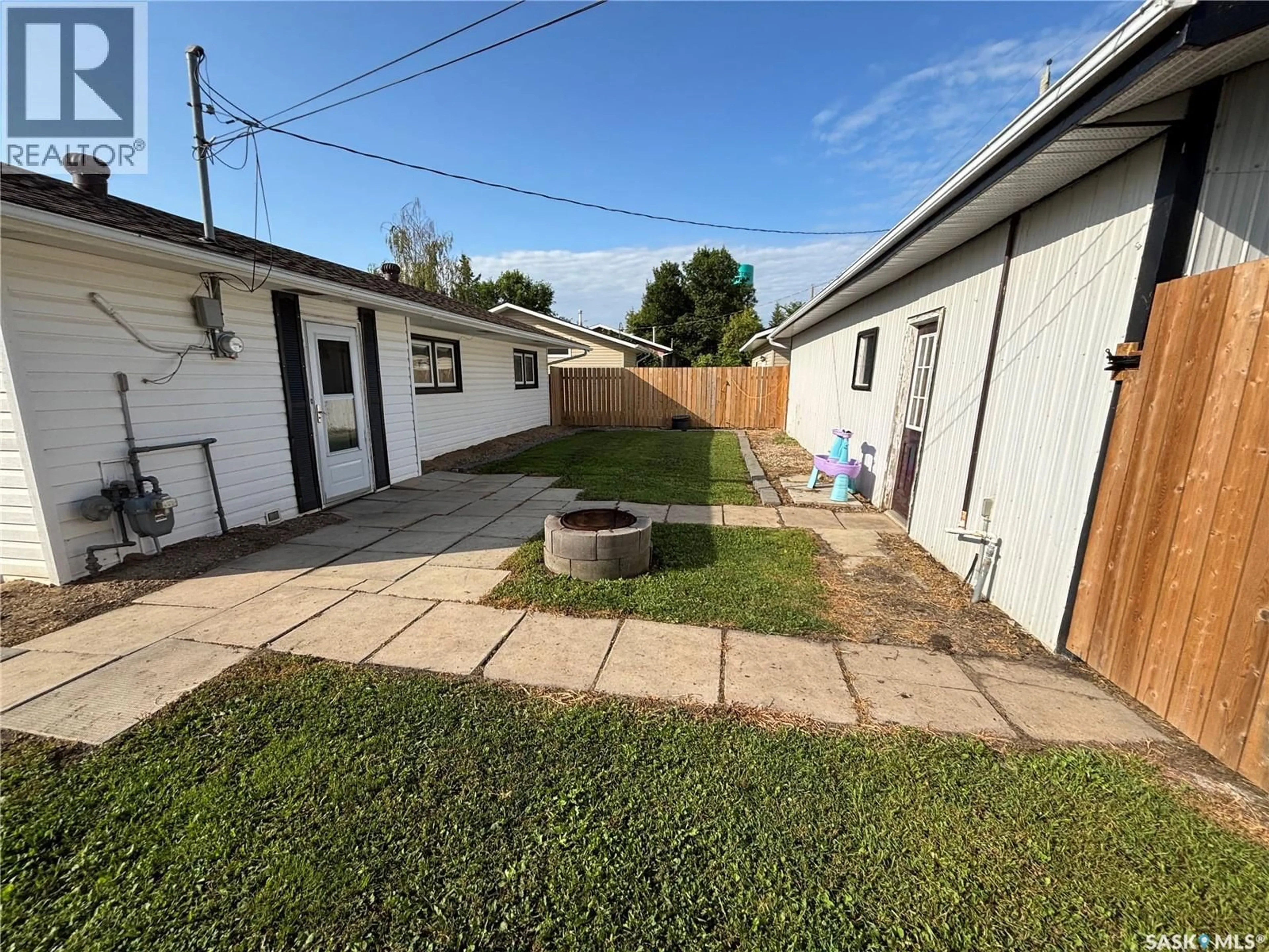 A pic from outside/outdoor area/front of a property/back of a property/a pic from drone, street for 114 SASKATCHEWAN CRESCENT, Kinistino Saskatchewan S0J1H0