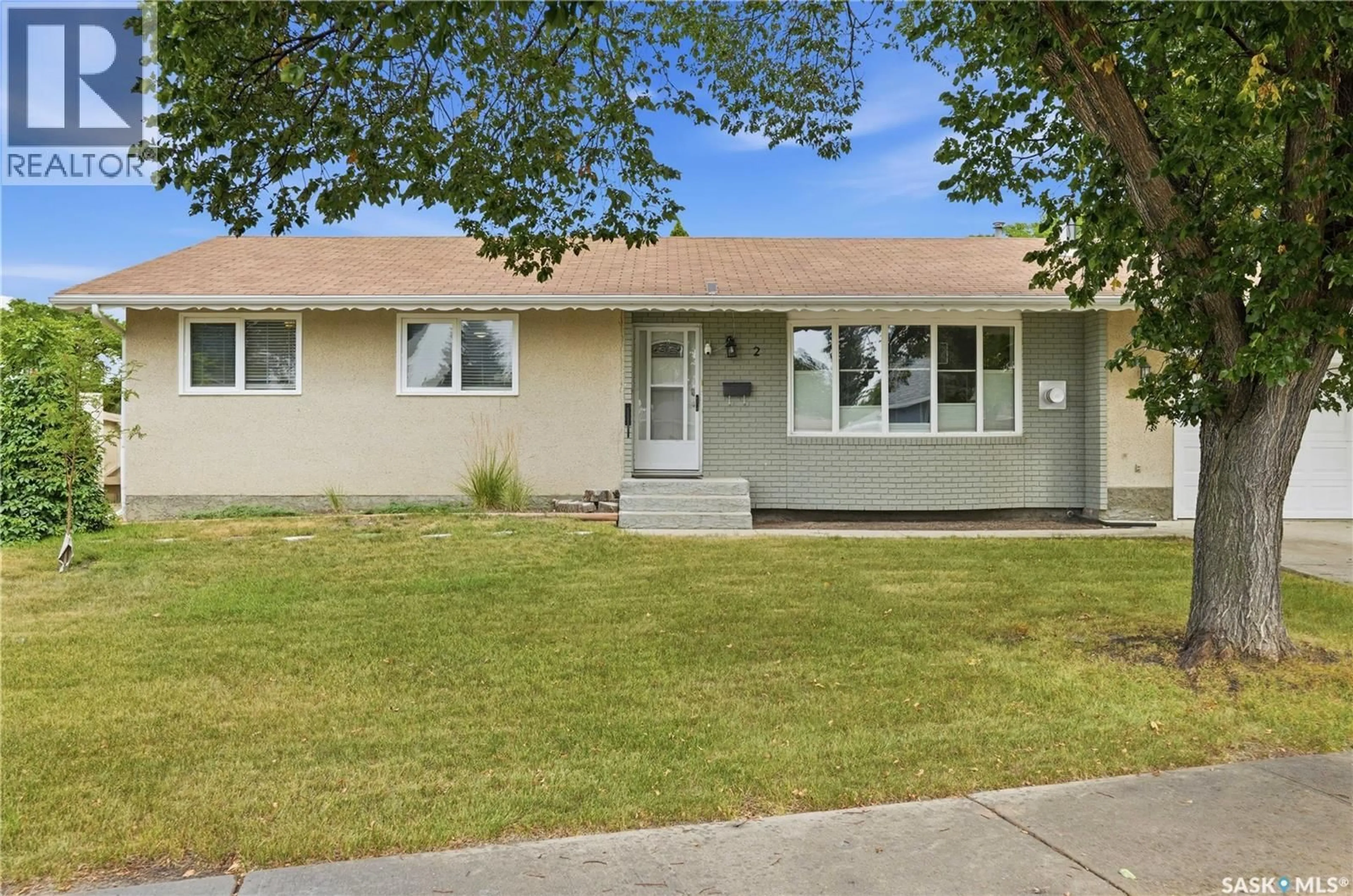 Home with vinyl exterior material, street for 2 SPRINGSTEIN AVENUE, Regina Saskatchewan S4R7H7