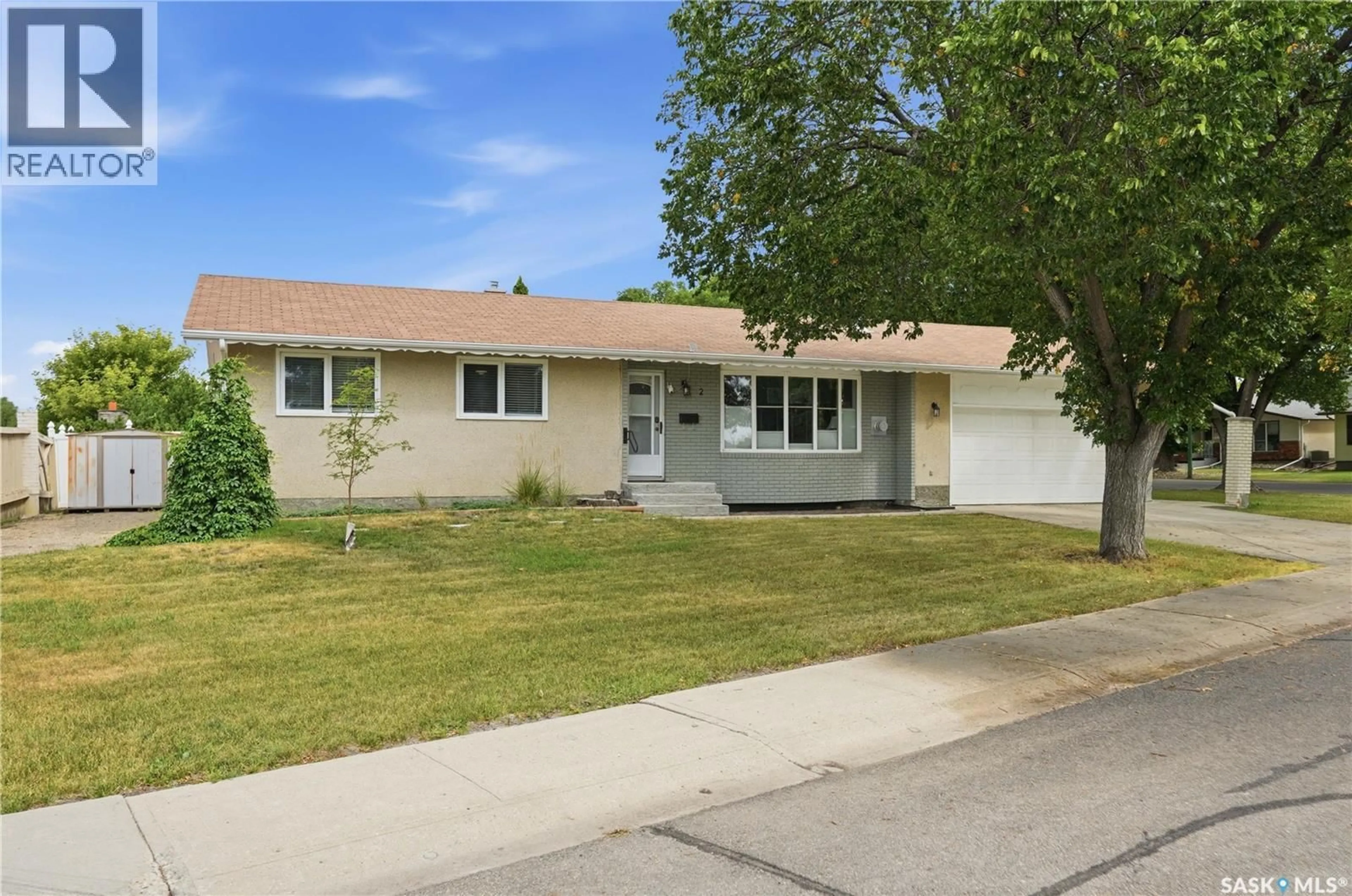 Home with vinyl exterior material, street for 2 SPRINGSTEIN AVENUE, Regina Saskatchewan S4R7H7