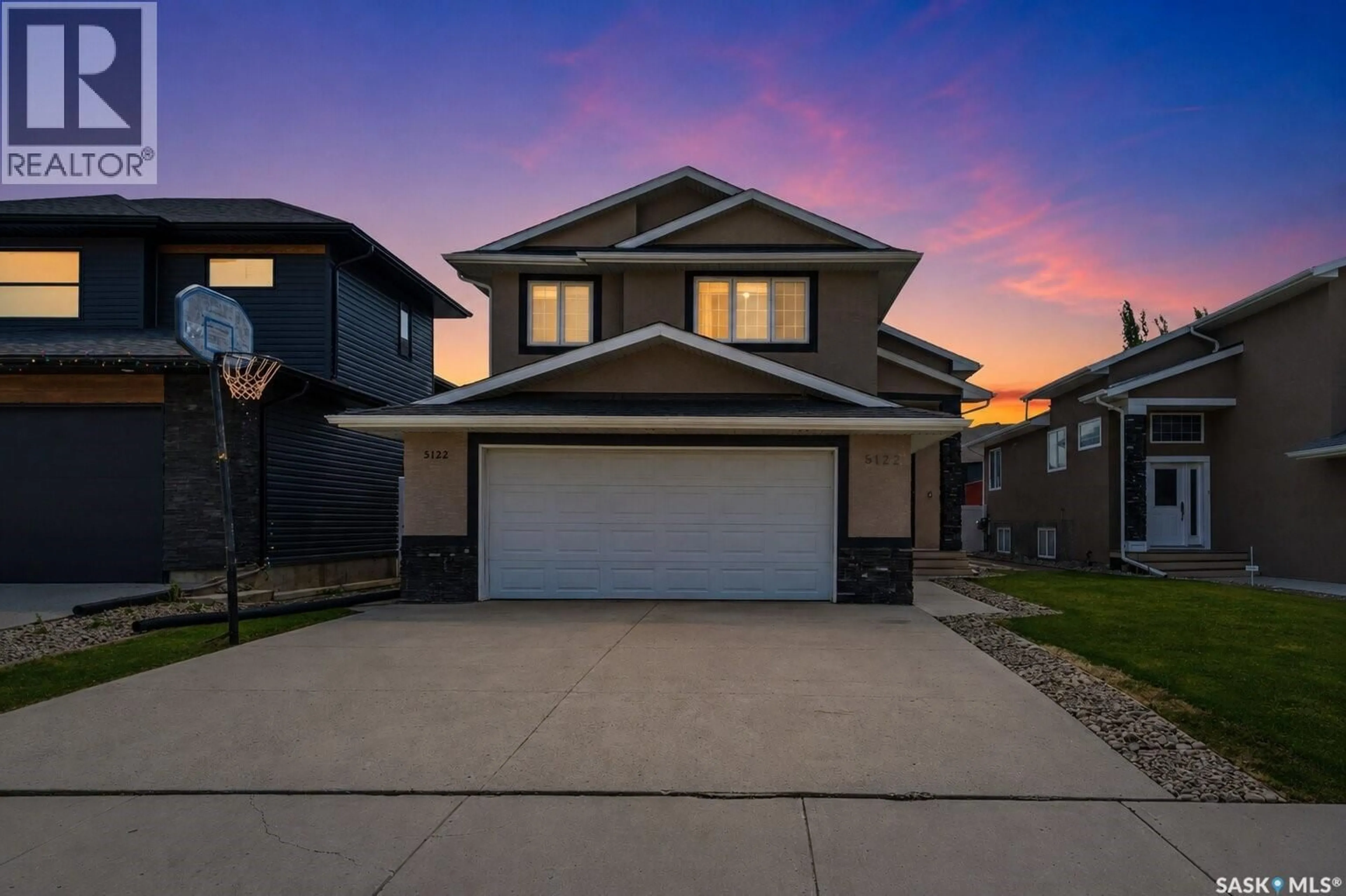 Home with vinyl exterior material, street for 5122 CANUCK CRESCENT, Regina Saskatchewan S4W0H1