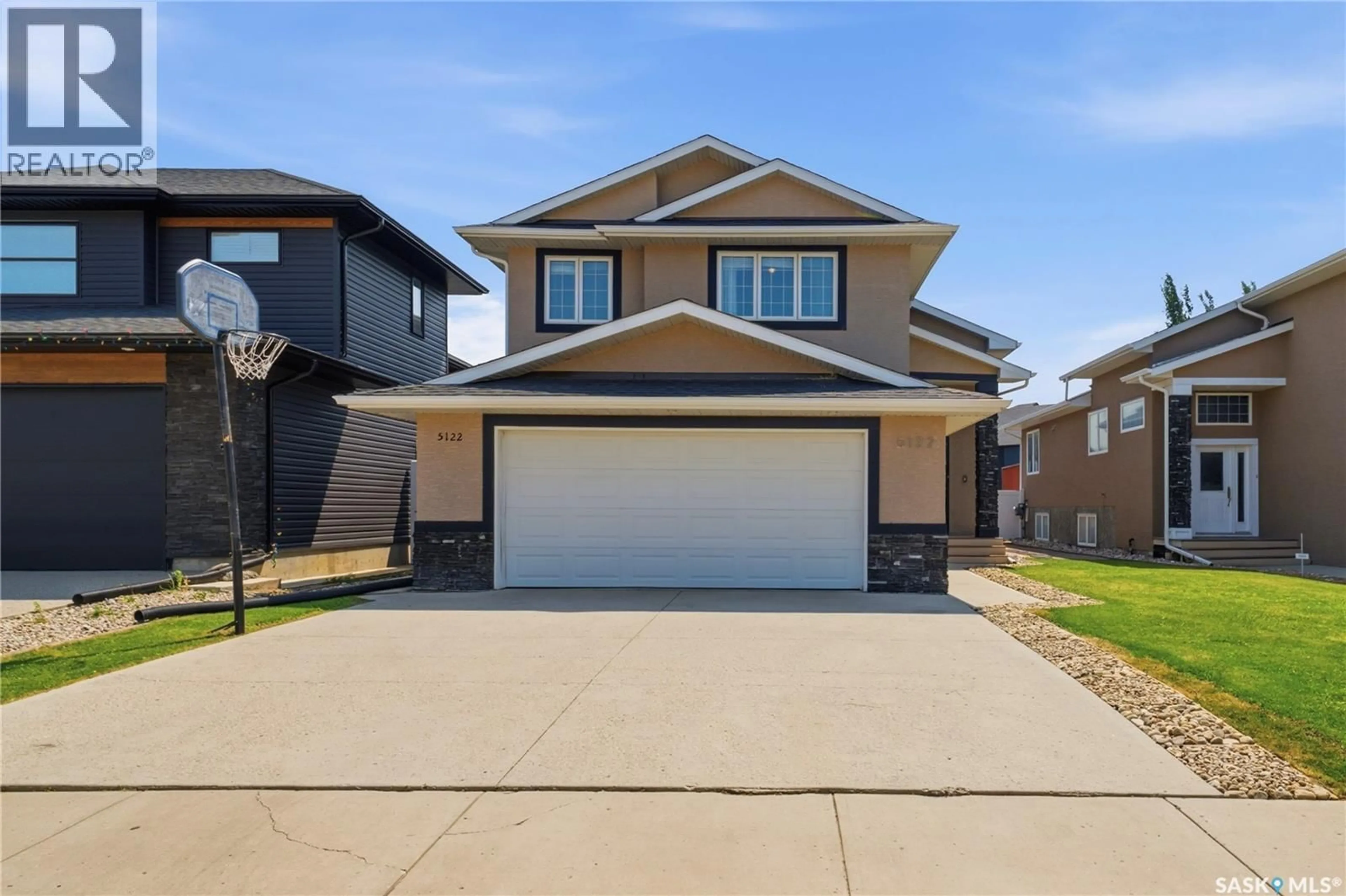 Home with vinyl exterior material, street for 5122 CANUCK CRESCENT, Regina Saskatchewan S4W0H1