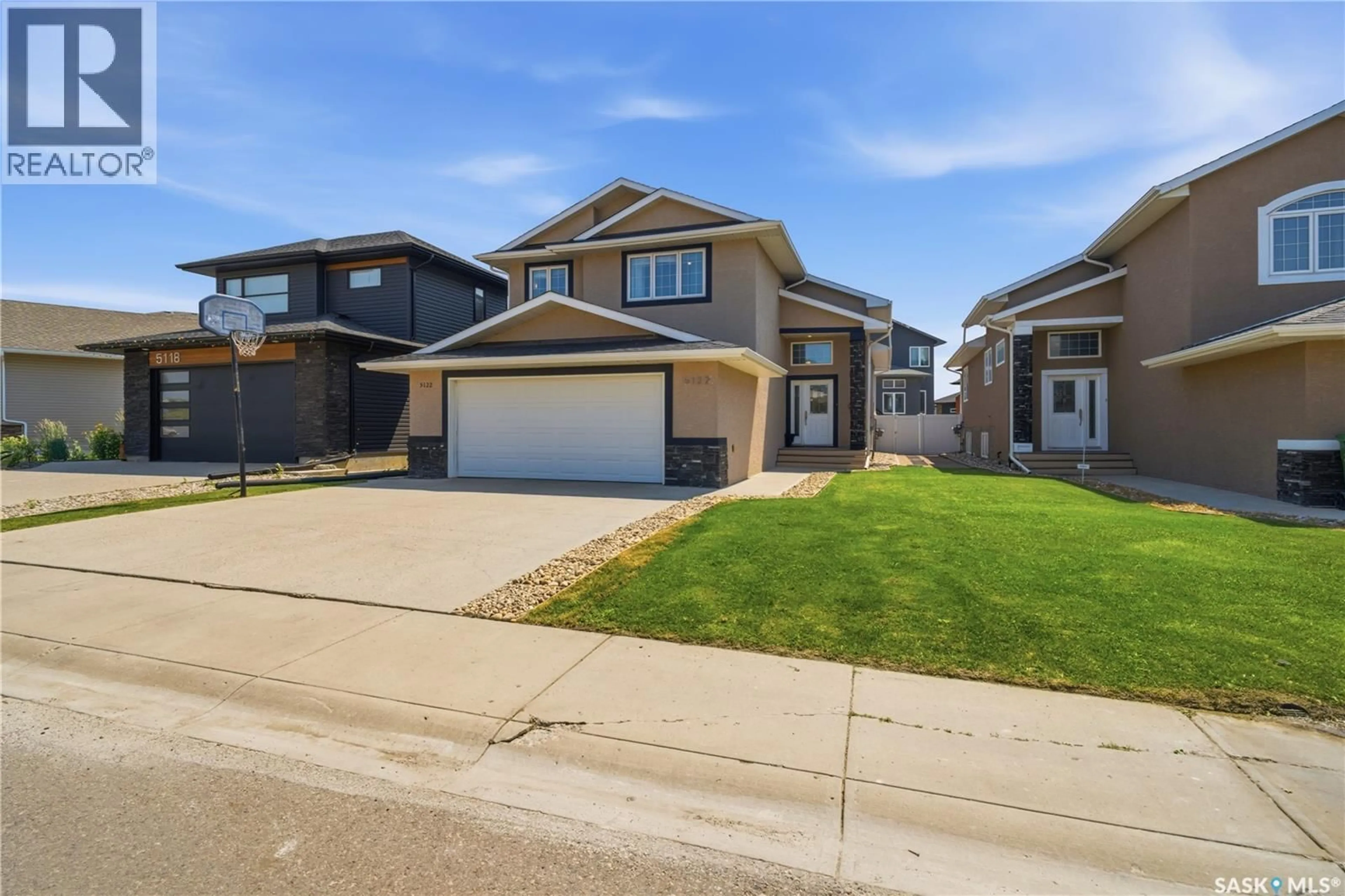 Home with vinyl exterior material, street for 5122 CANUCK CRESCENT, Regina Saskatchewan S4W0H1