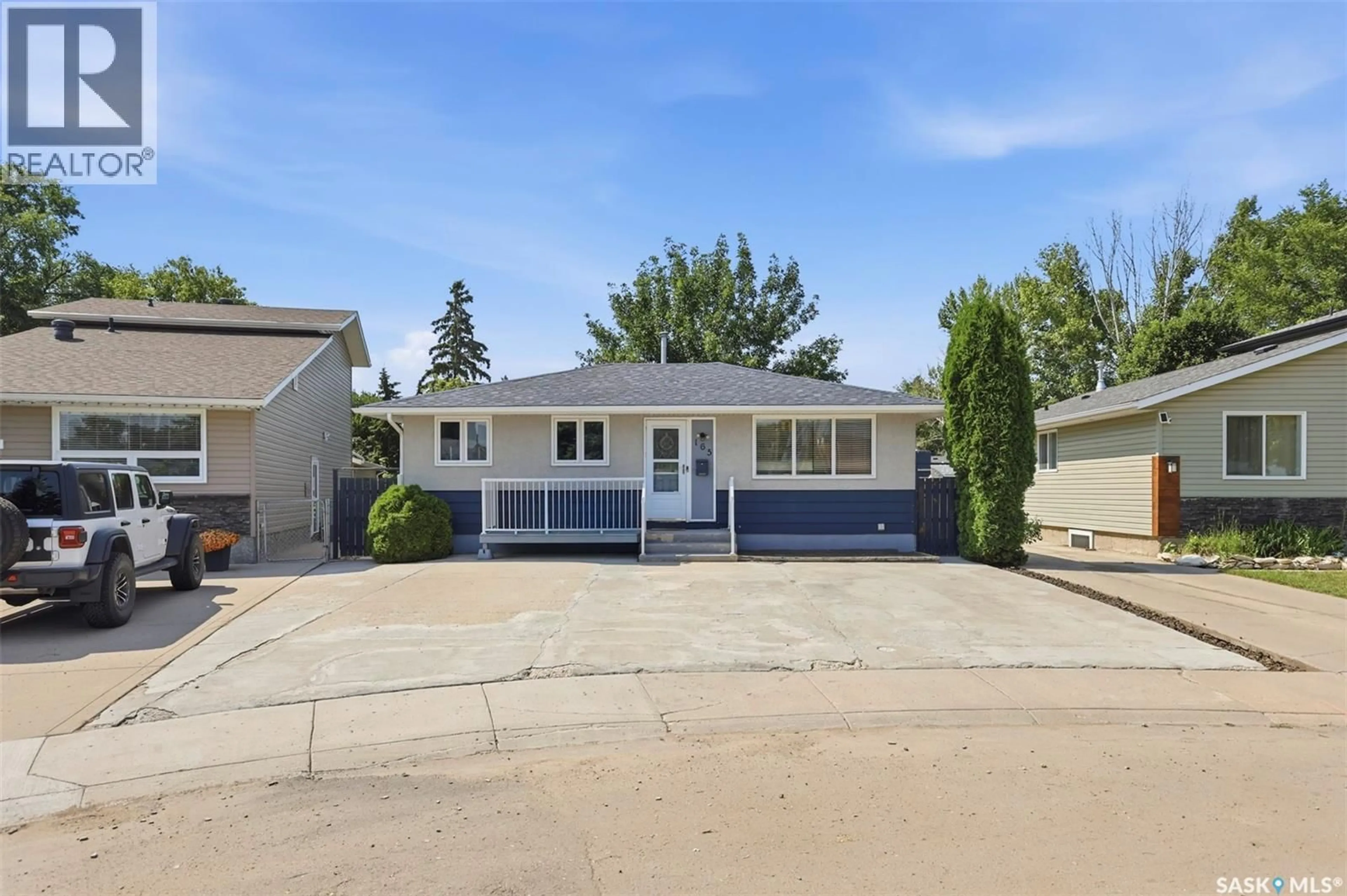 Home with vinyl exterior material, street for 165 ACADIA COURT, Saskatoon Saskatchewan S7H4C4