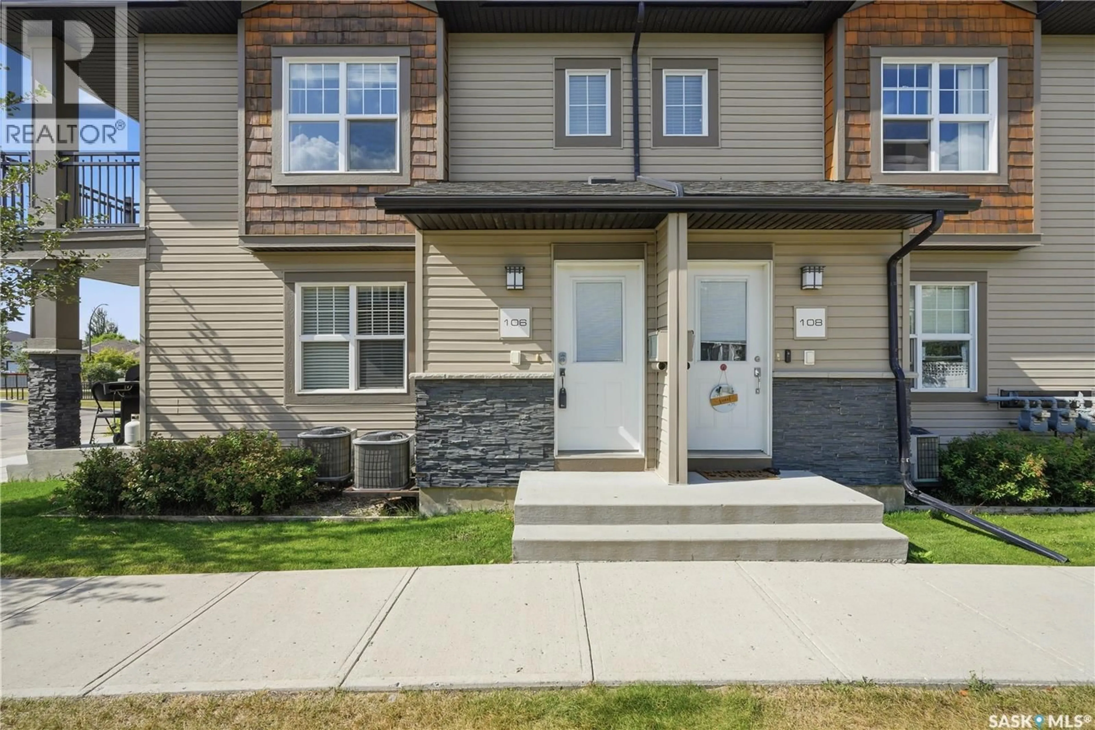 Home with vinyl exterior material, street for 106 - 2315 MCCLOCKLIN ROAD, Saskatoon Saskatchewan S7R0K8