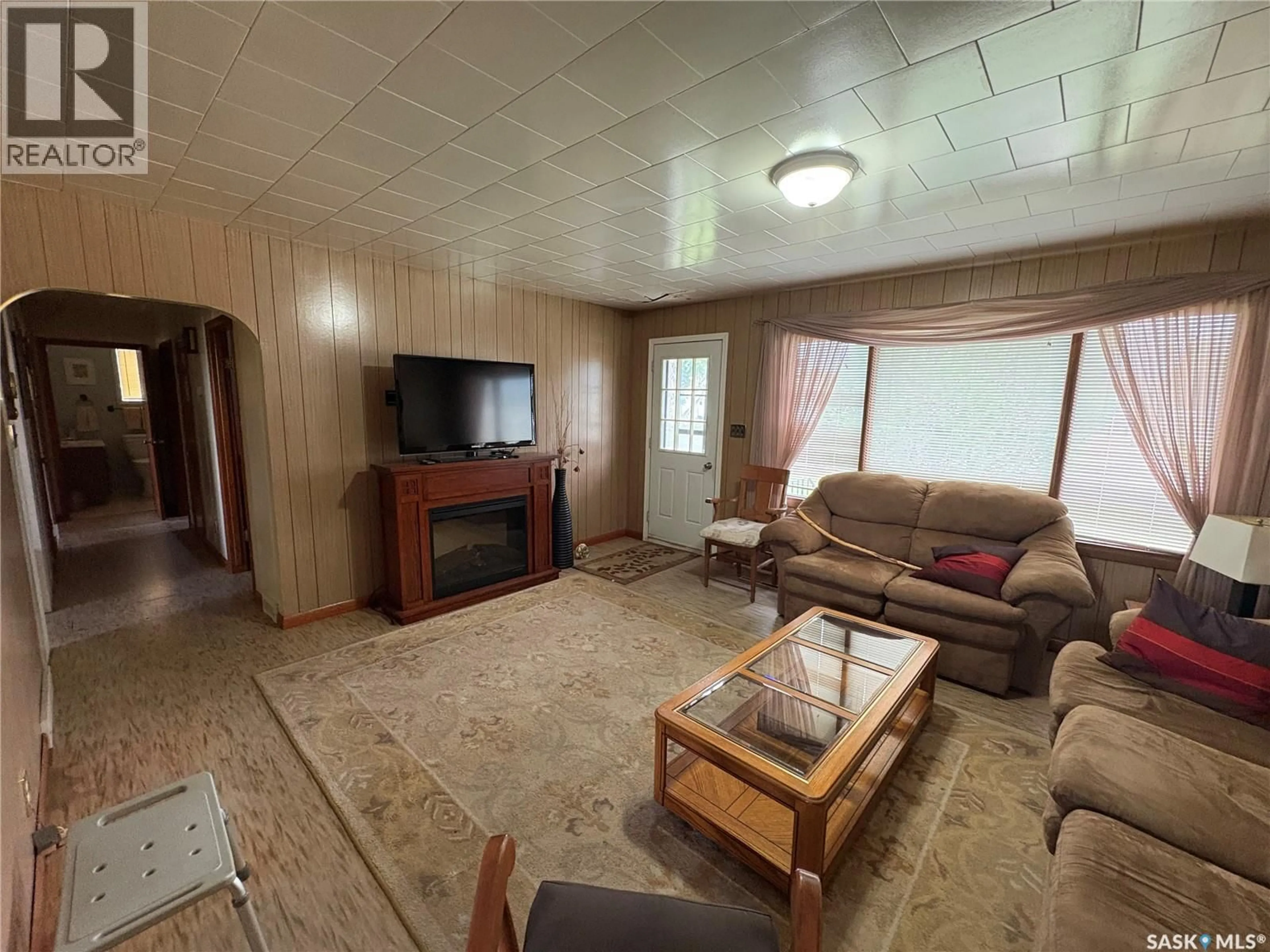Living room with furniture, unknown for 415 SASKATCHEWAN AVENUE, Foam Lake Saskatchewan S0A1A0