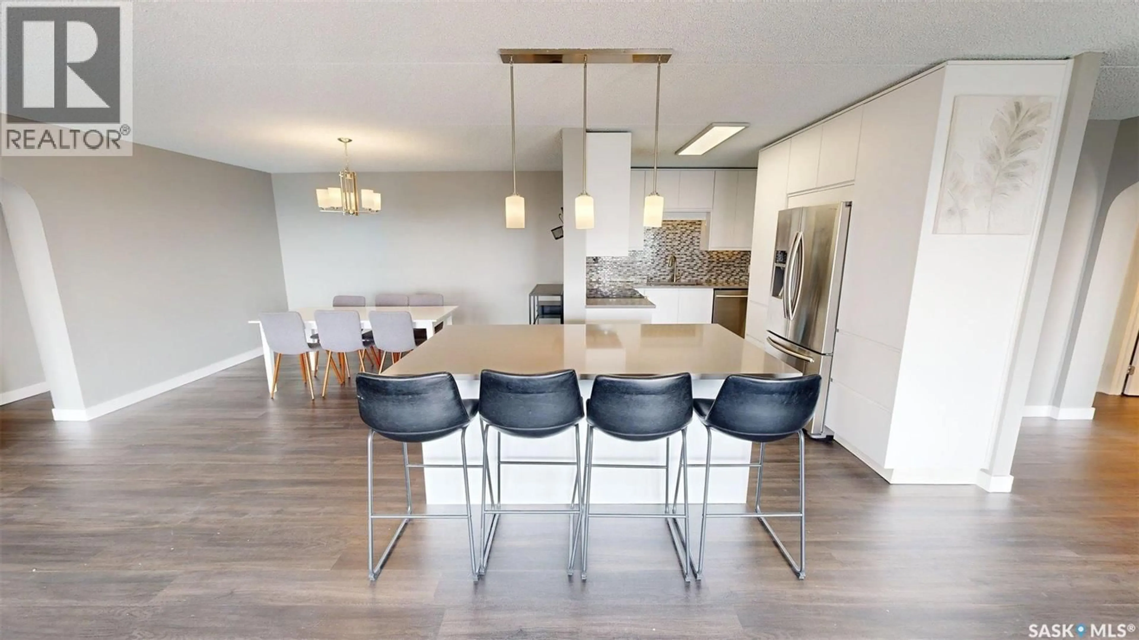 Open concept kitchen, wood/laminate floor for 3520 - 2104 HILLSDALE STREET, Regina Saskatchewan S4S5Z5
