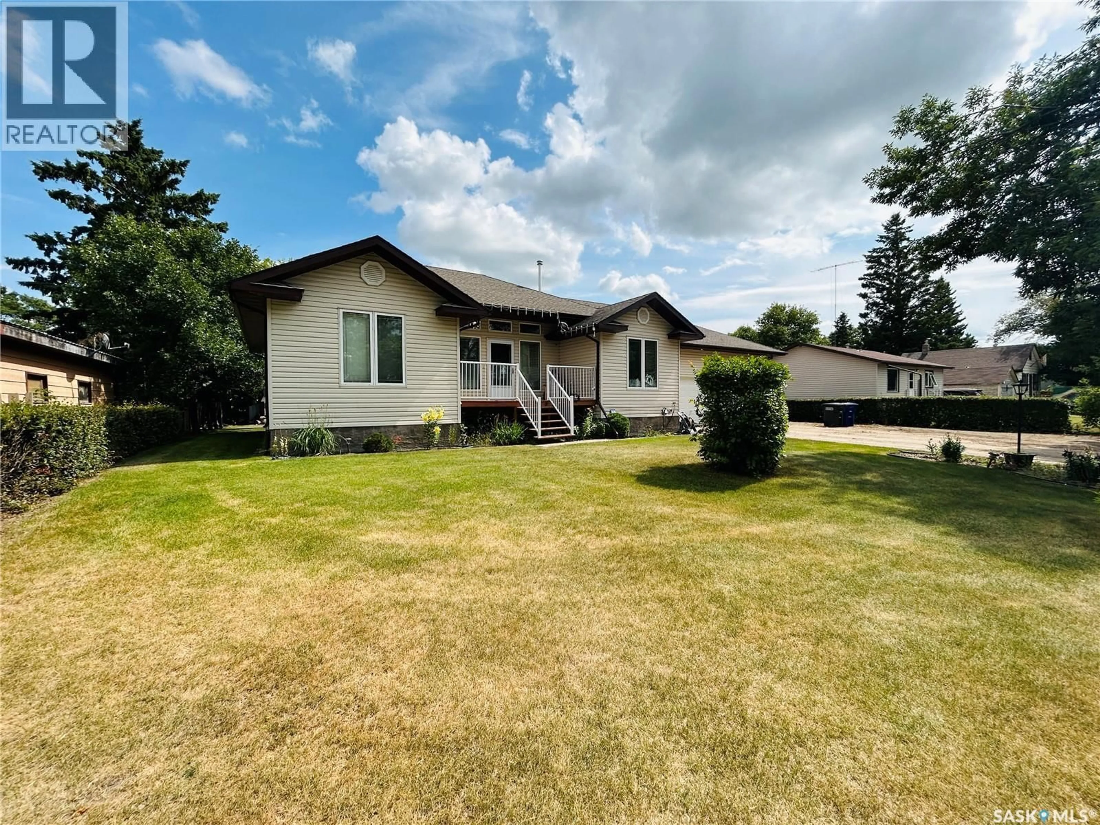 A pic from outside/outdoor area/front of a property/back of a property/a pic from drone, unknown for 214 3RD STREET, Watson Saskatchewan S0K4V0
