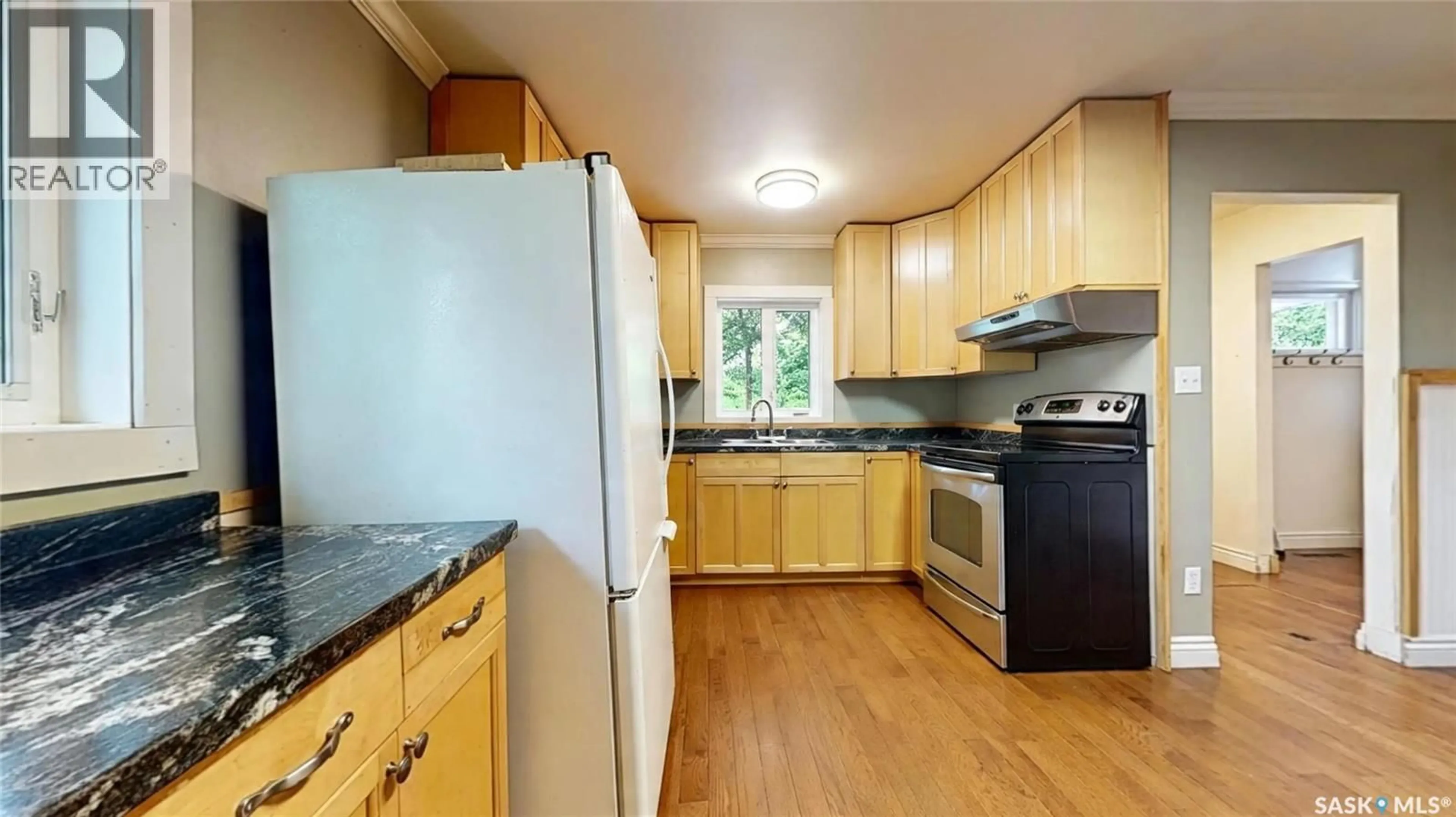 Standard kitchen, wood/laminate floor for 102-104 MARSH STREET, Maple Creek Saskatchewan S0N1N0
