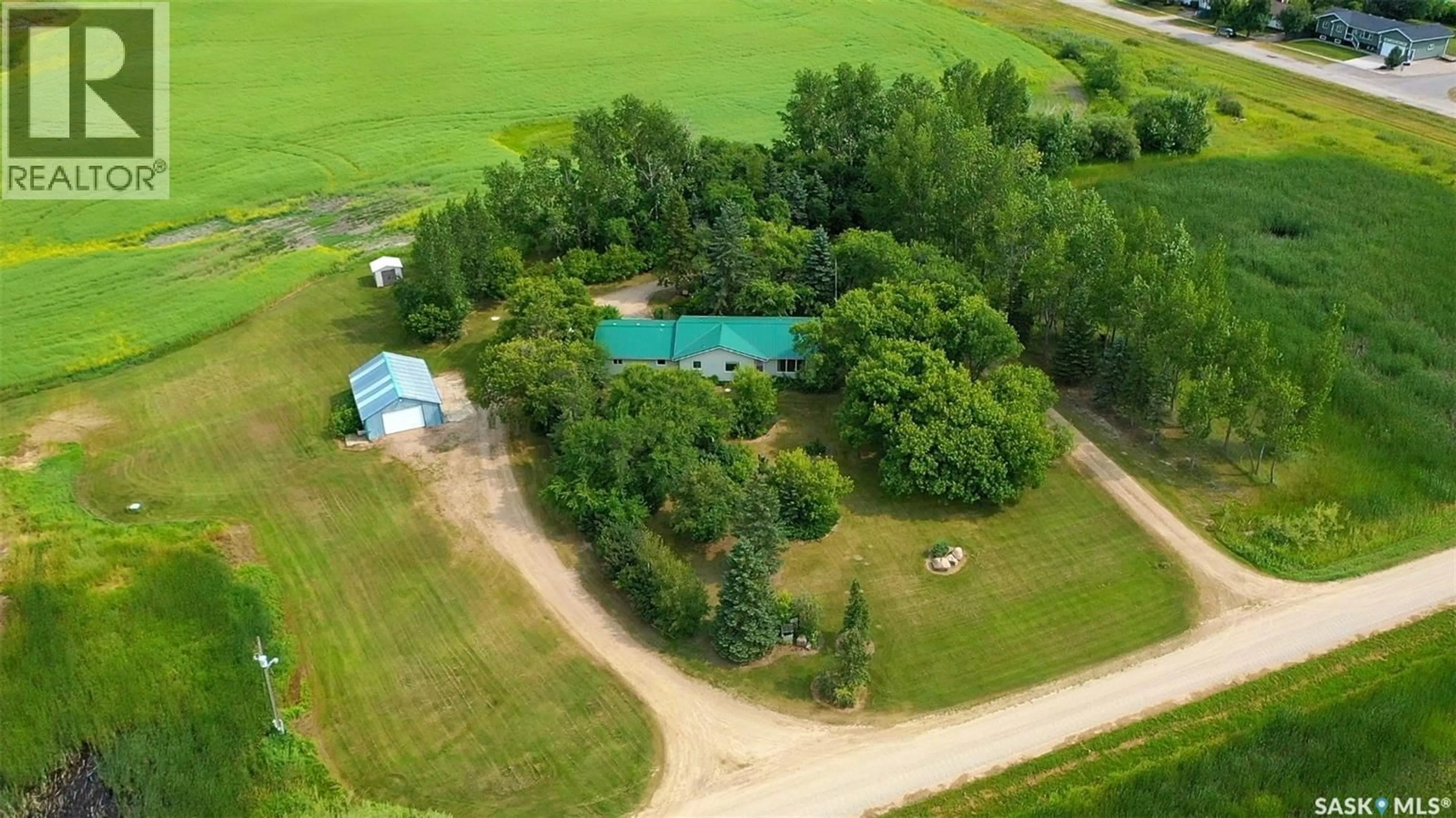 A pic from outside/outdoor area/front of a property/back of a property/a pic from drone, water/lake/river/ocean view for 100 HENDERSON STREET, Grayson Saskatchewan S0A1E0