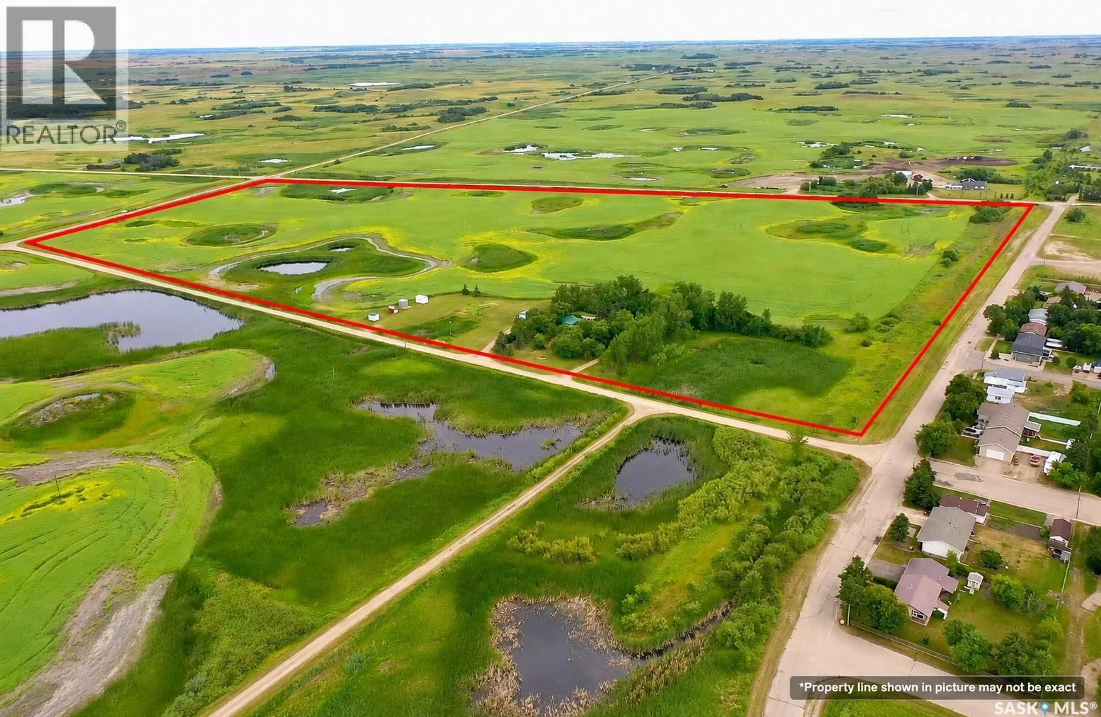 A pic from outside/outdoor area/front of a property/back of a property/a pic from drone, water/lake/river/ocean view for 100 HENDERSON STREET, Grayson Saskatchewan S0A1E0