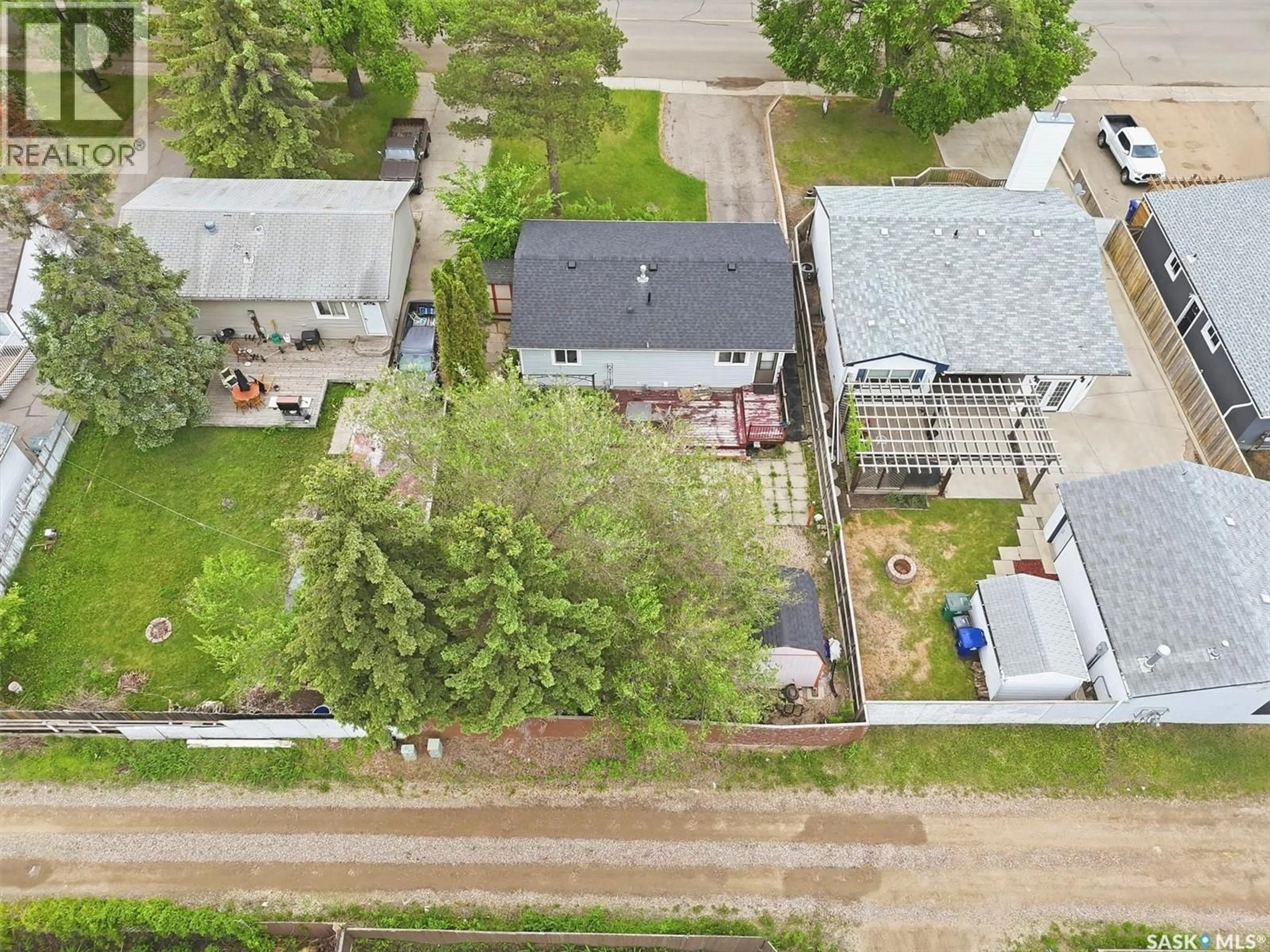 A pic from outside/outdoor area/front of a property/back of a property/a pic from drone, street for 1305 W AVENUE N, Saskatoon Saskatchewan S7L3J2