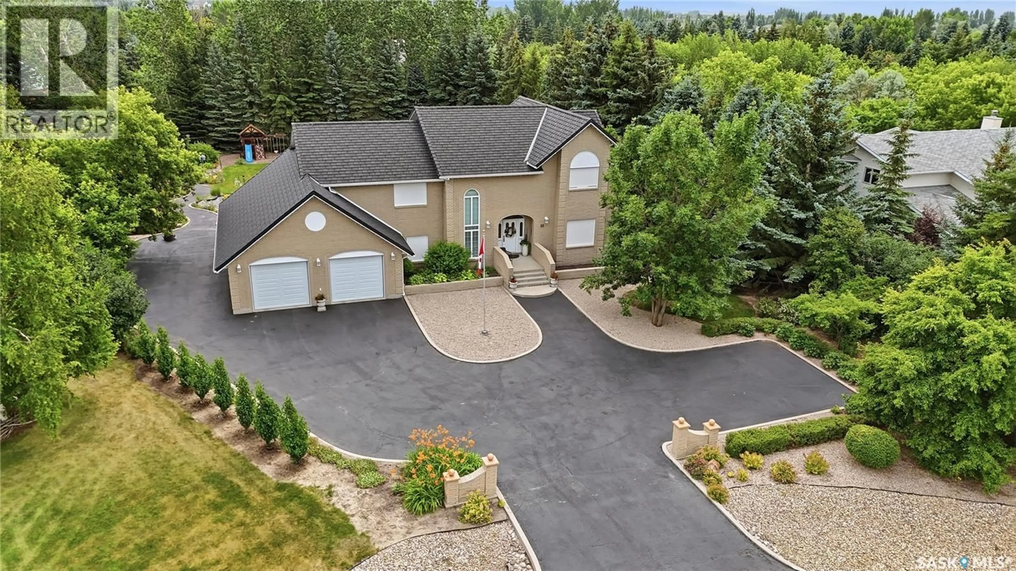 A pic from outside/outdoor area/front of a property/back of a property/a pic from drone, mountain view for 10 RUBY PLACE, Edenwold Rm No.158 Saskatchewan S4L1A9
