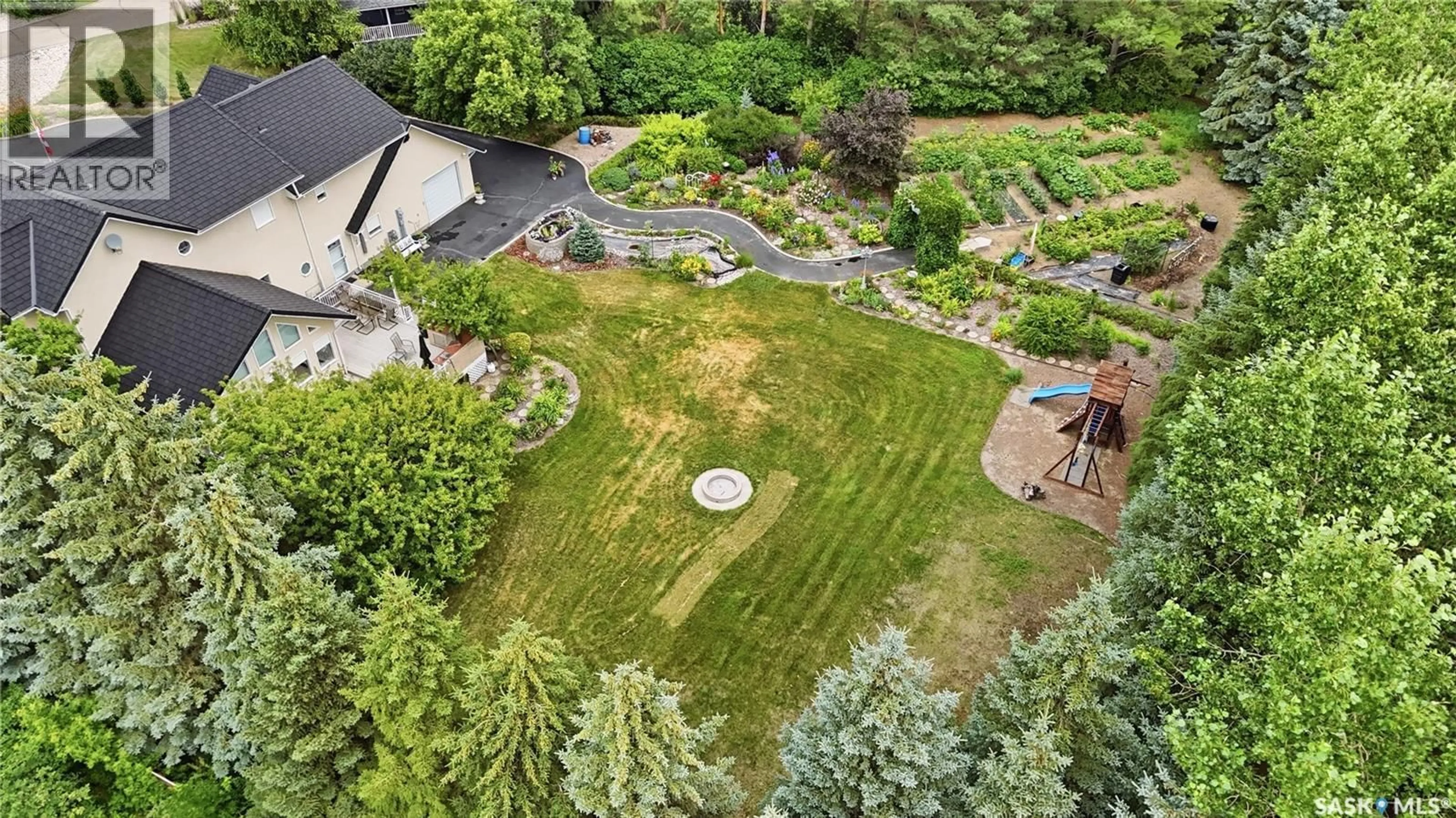 A pic from outside/outdoor area/front of a property/back of a property/a pic from drone, mountain view for 10 RUBY PLACE, Edenwold Rm No.158 Saskatchewan S4L1A9