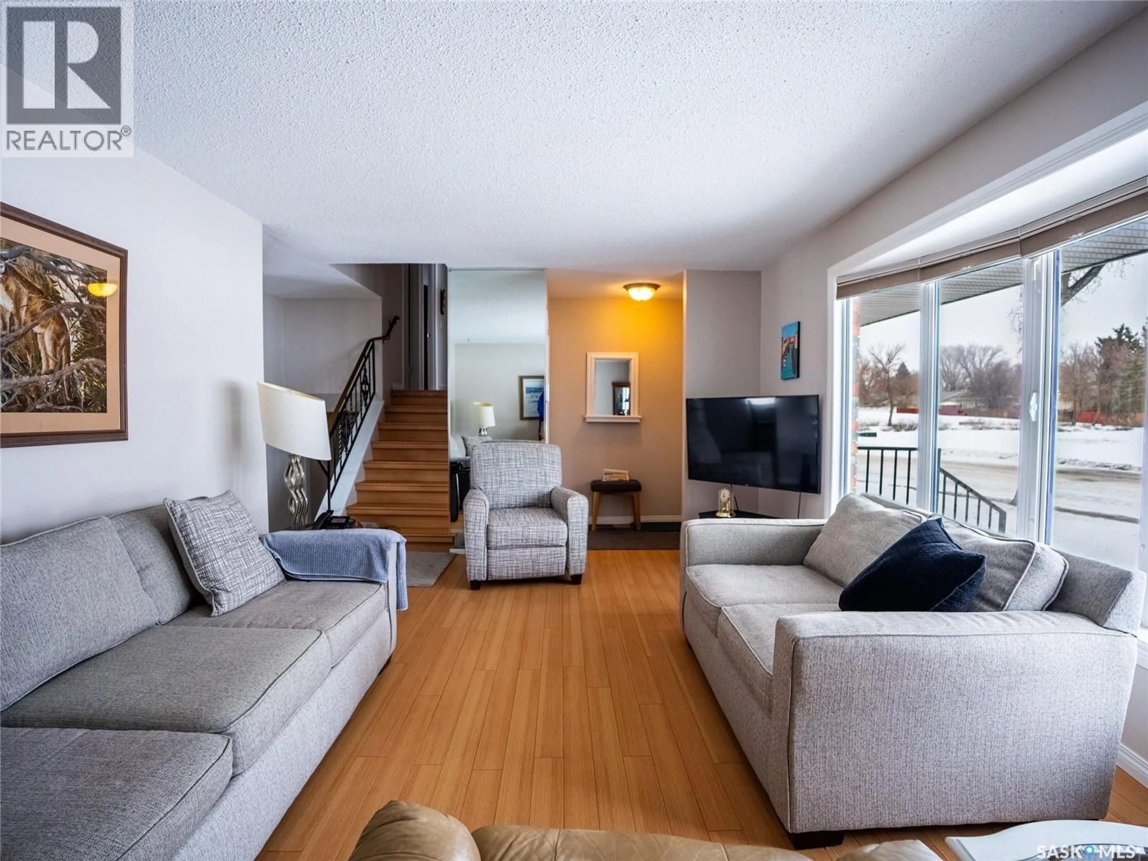 Living room with furniture, unknown for 15 DICKINSON CRESCENT, Regina Saskatchewan S4R7K6
